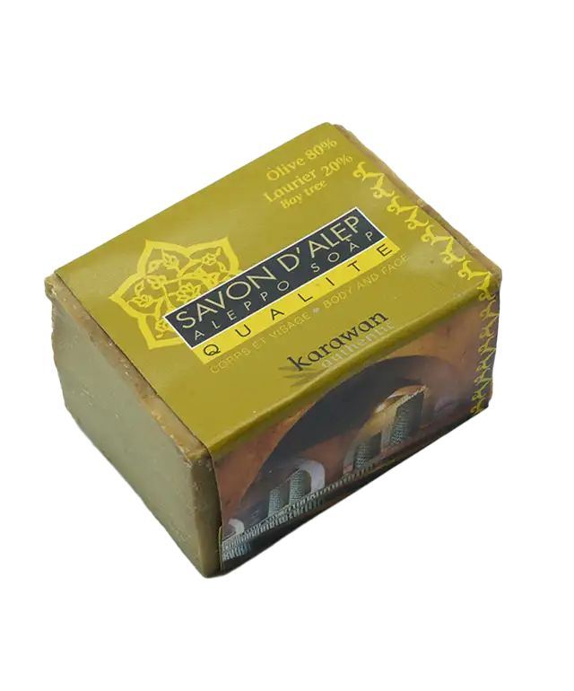 20% laurel oil Aleppo soap in band and another bar soap on a fouta