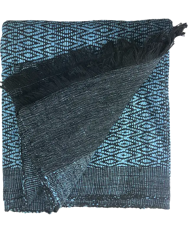 Woman wearing an Adriatic blue wild silk stole draped over her shoulders