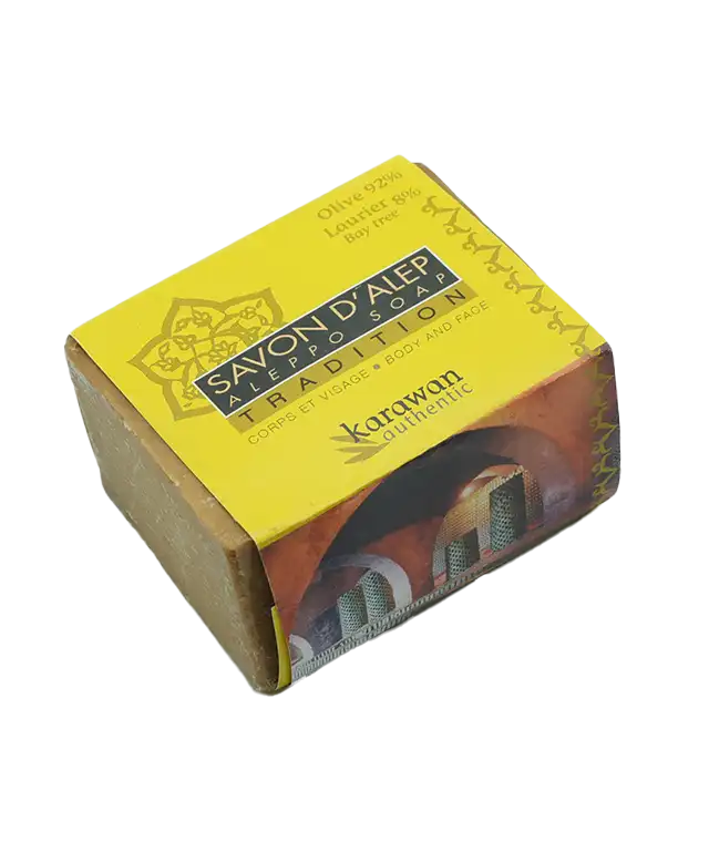 "Tradition" Aleppo soap with 8% laurel oil in a packaging and unwrapped soap