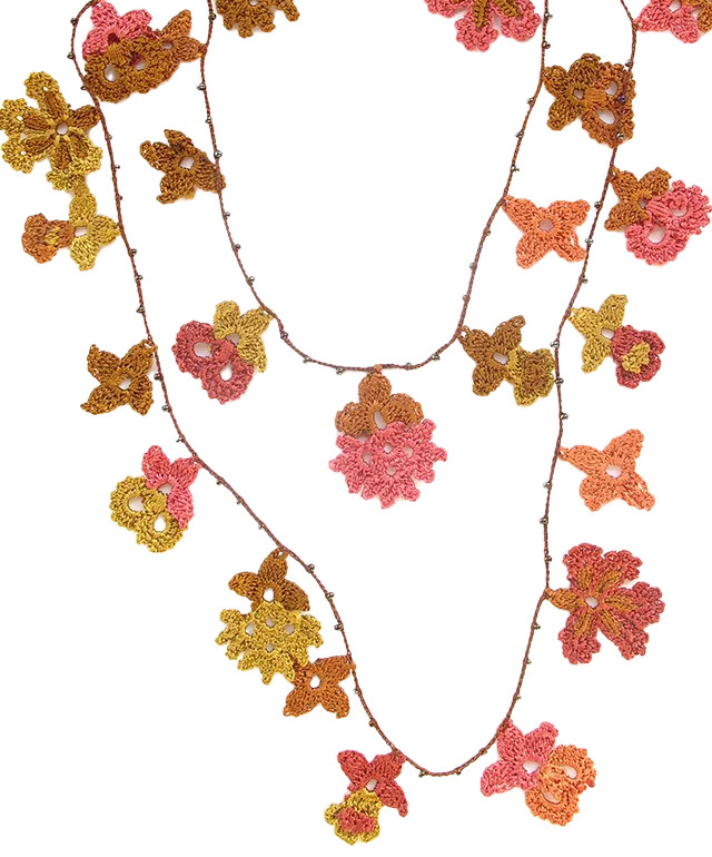 Kapadokya Autumn lace necklace with floral motifs, worn with a white top