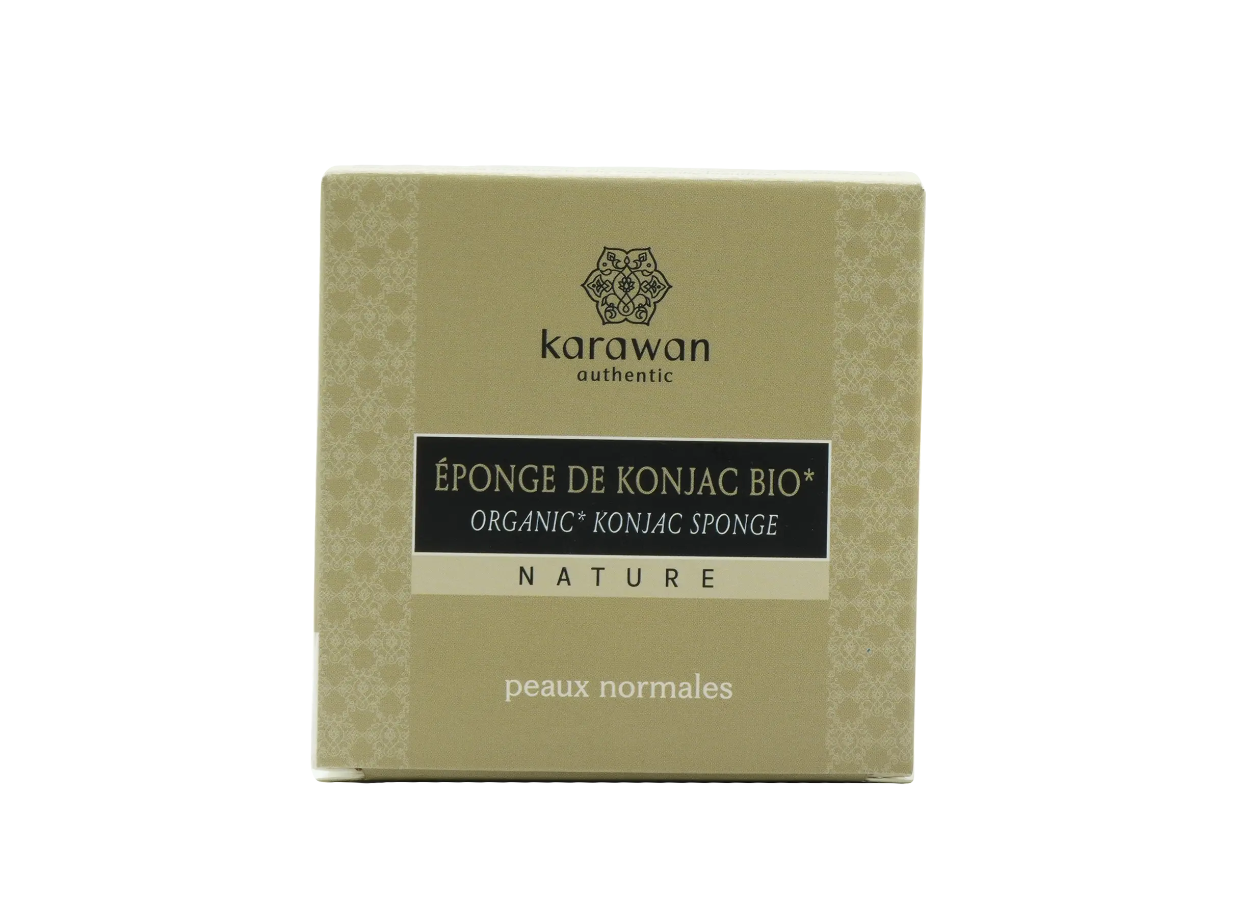 Éponge de konjac bio naturelle sur un porte savon en verre, à côté d'un savon d'Alep