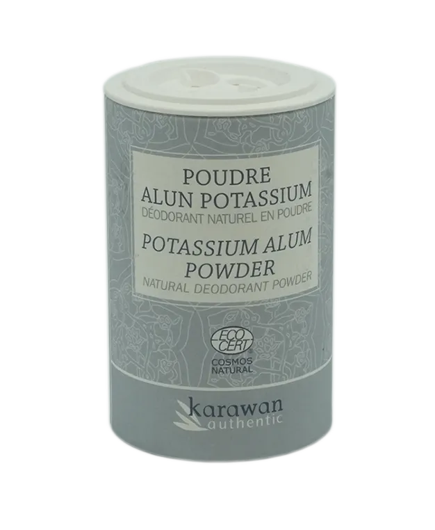 Two tins of potassium alum powder, one upright and one upside down
