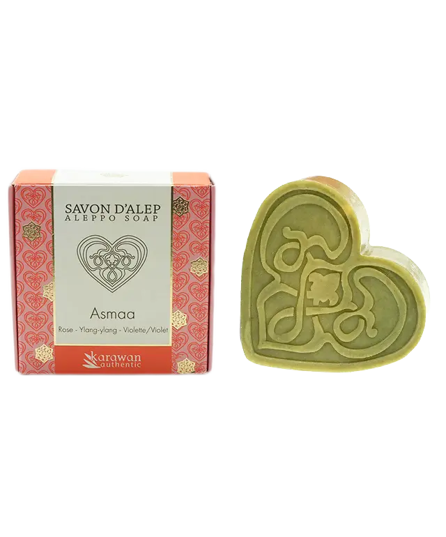 Asmaa scented Aleppo soap, heart-shaped and rose-scented, next to its gold box