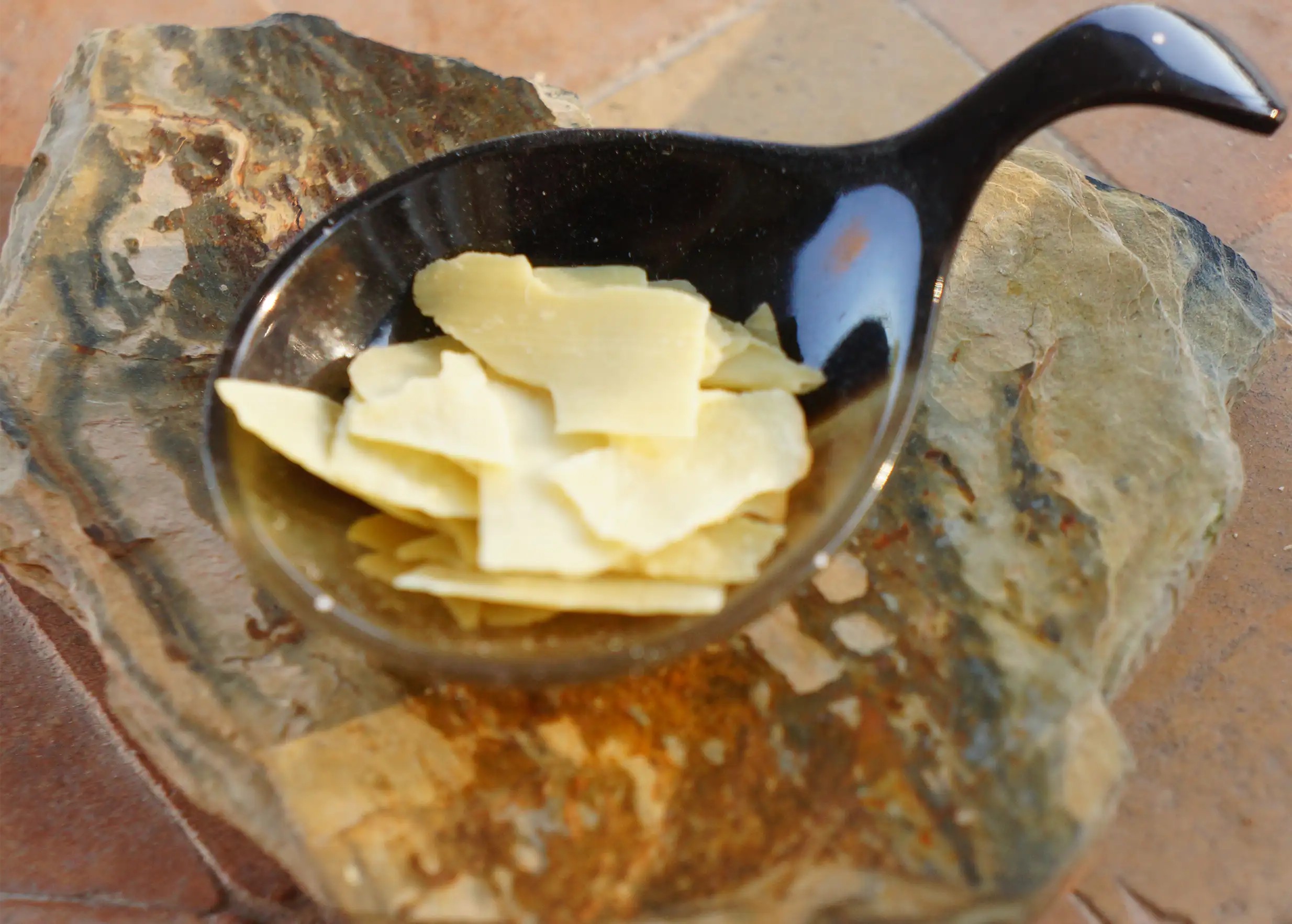 Aleppo soap flakes and black horn spoon Aleppo soap flakes and black horn spoon