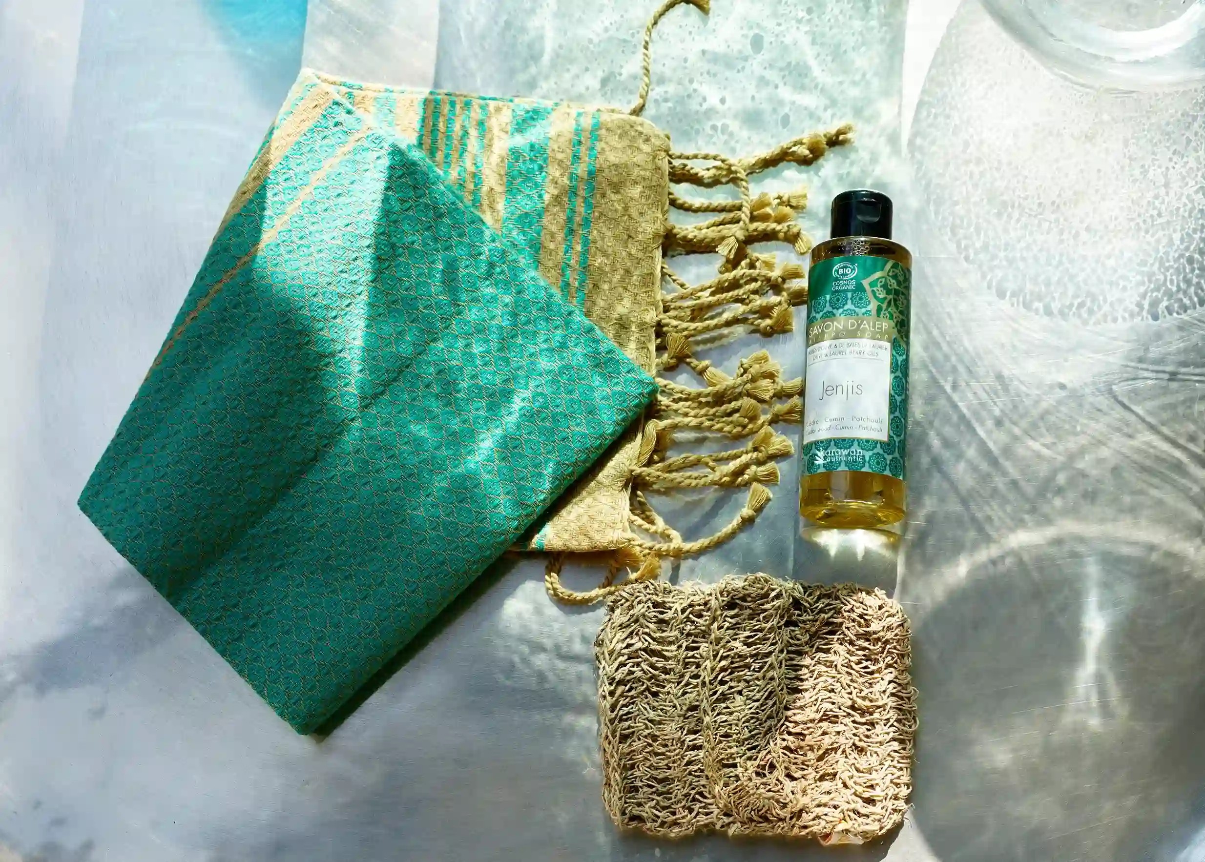 Jenjis scented liquid Alep soap, scrubbing glove and organic cotton fouta Jenjis scented liquid Alep soap, scrubbing glove and organic cotton fouta