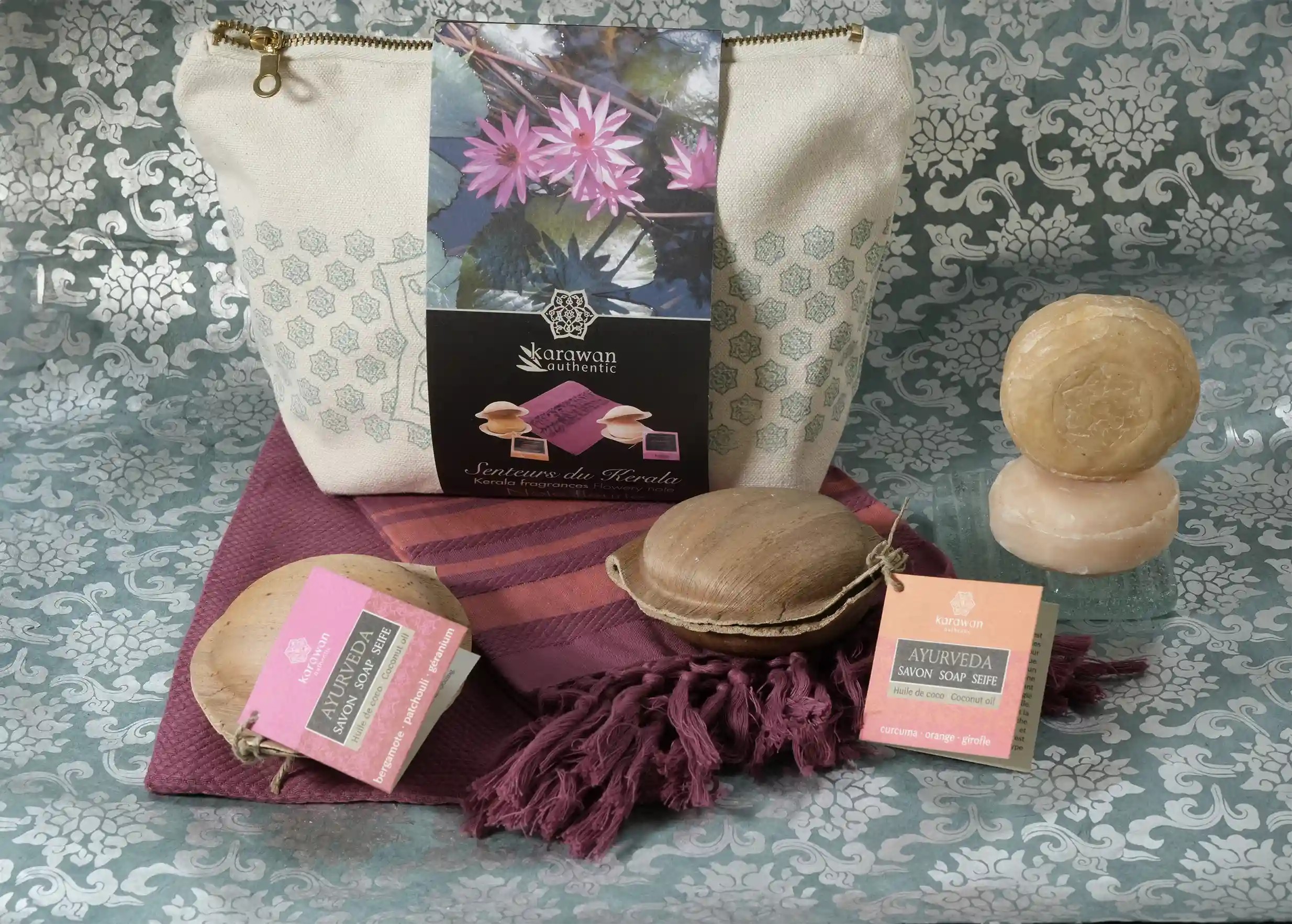 Cotton case with wrap, purple fouta with knotted fringes, and set of ayurvedic soaps