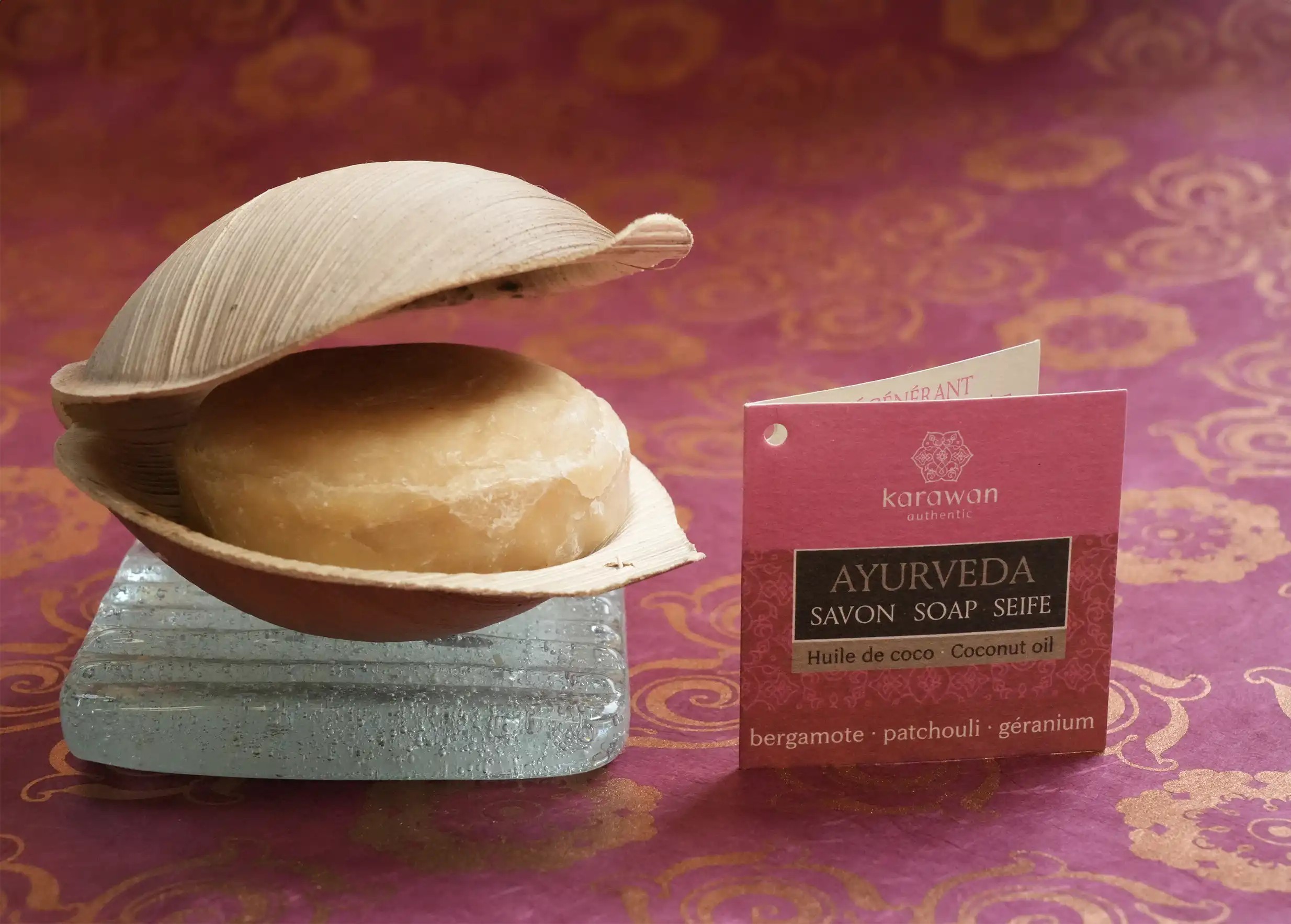 100g Ayurvedic bergamot soap in a vegetable shell, on a glass soap dish, with cardboard label