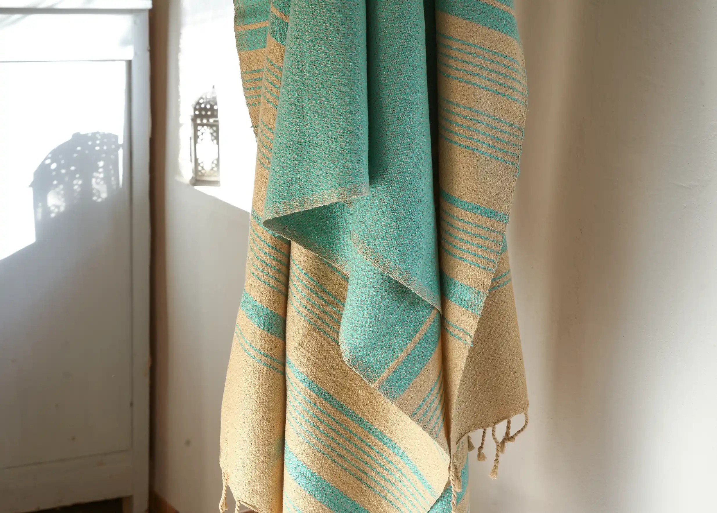 Aquasky-coloured fouta by Karawan authentic in a bathroom