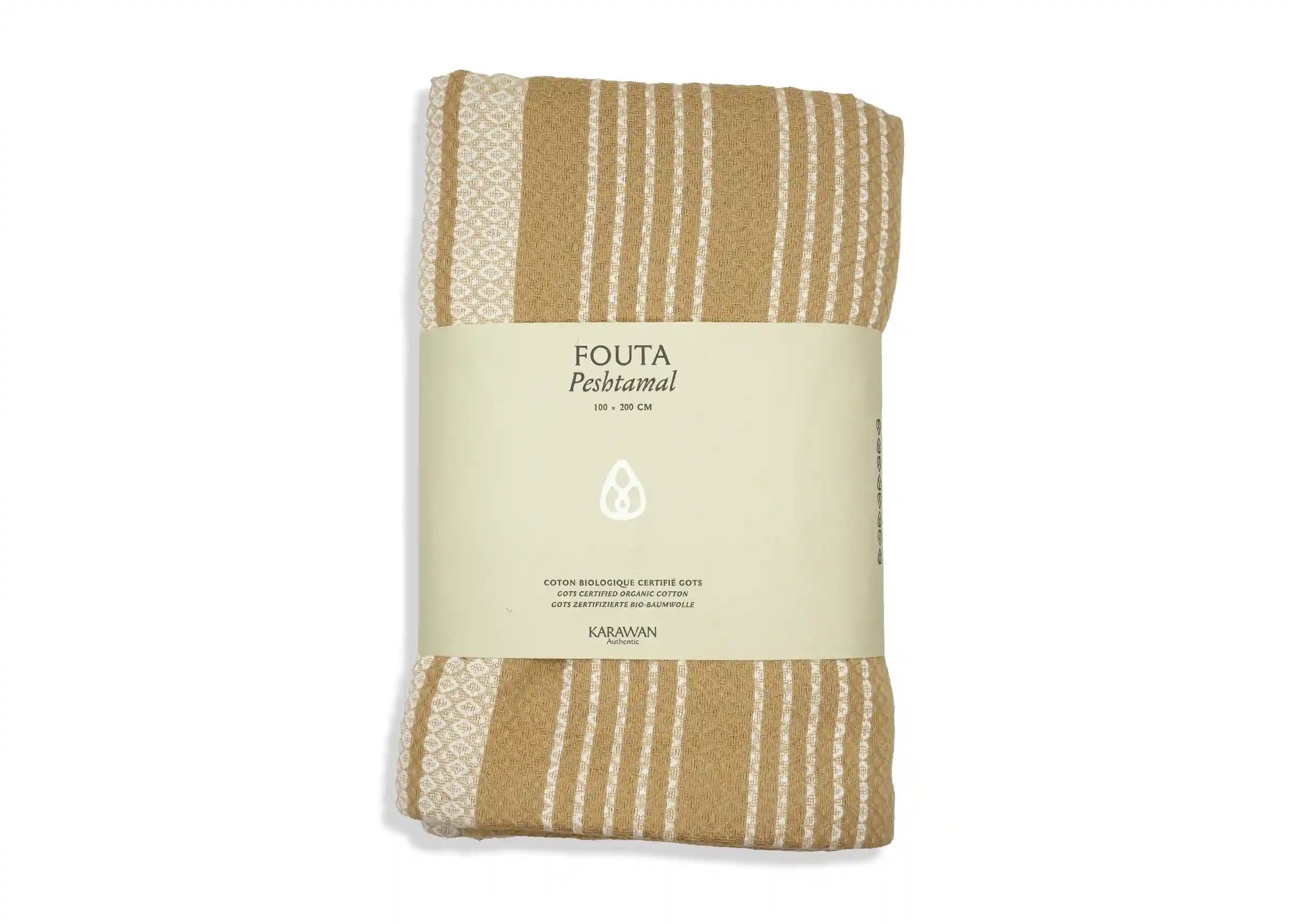 Pure white coloured organic cotton fouta from the  Sand collection, packshot  photo with packaging band