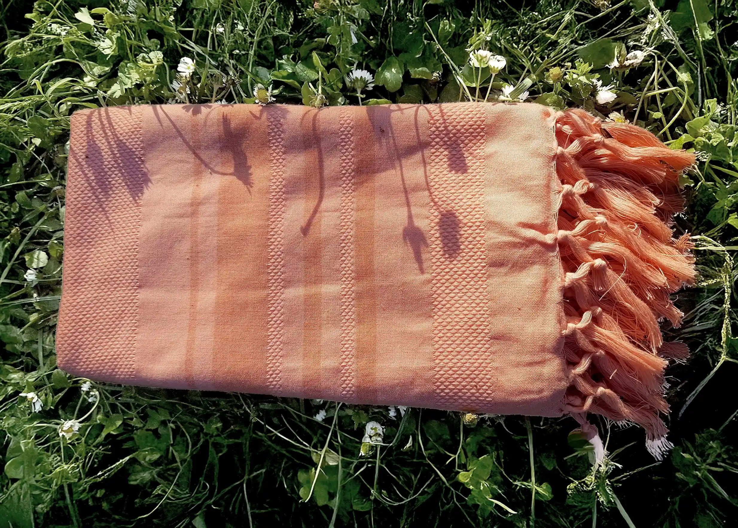 Coral-coloured organic cotton foutas by Karawan authentic
