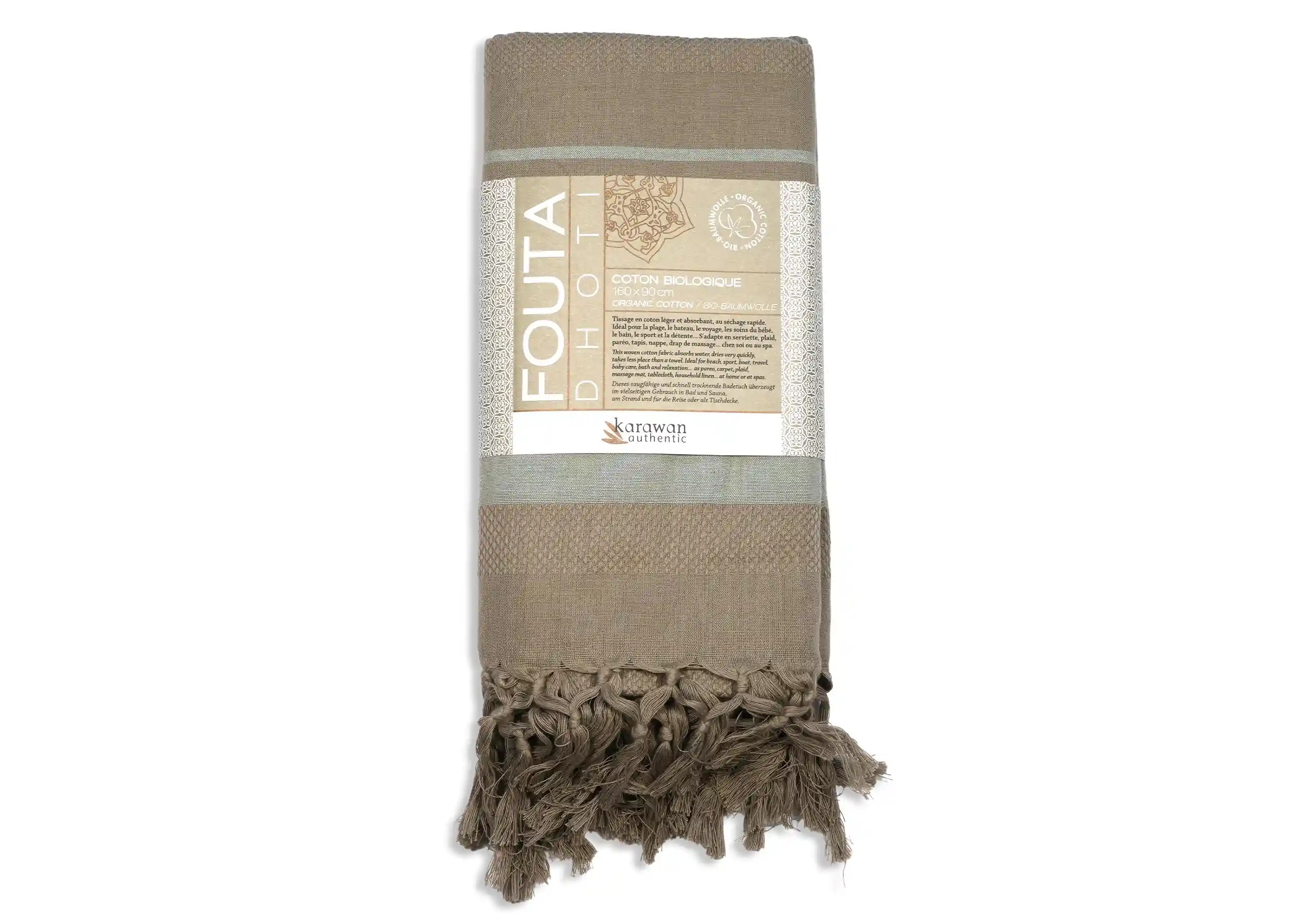 Earth beige coloured fouta in organic cotton, packshot photo with packaging band