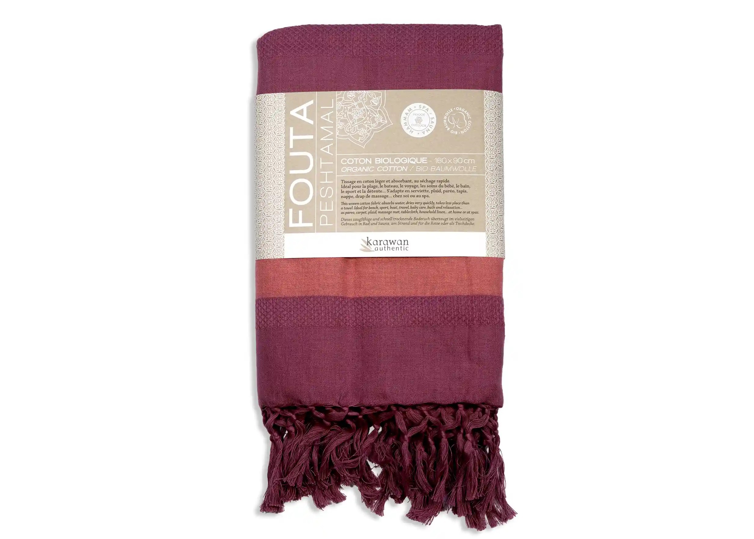 Fouta coton bio coloris fushia de la collection Garden, photo prise en packshot avec bandeau packaging