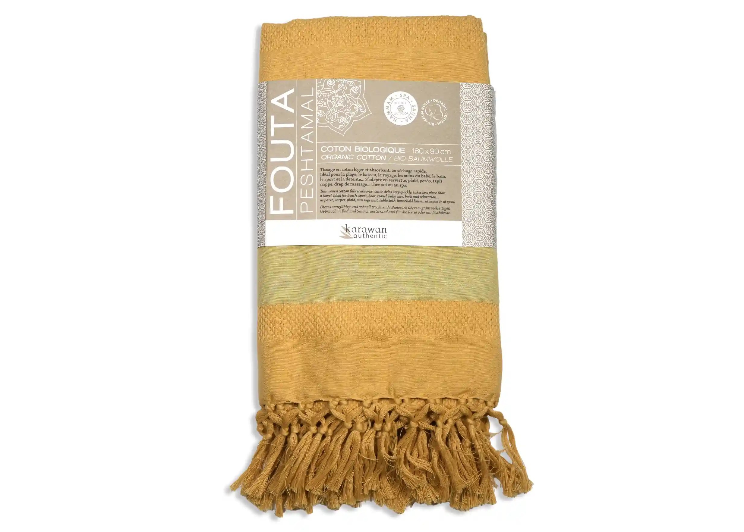 Yellow-coloured organic cotton fouta from the Garden collection, packshot photo with packaging band