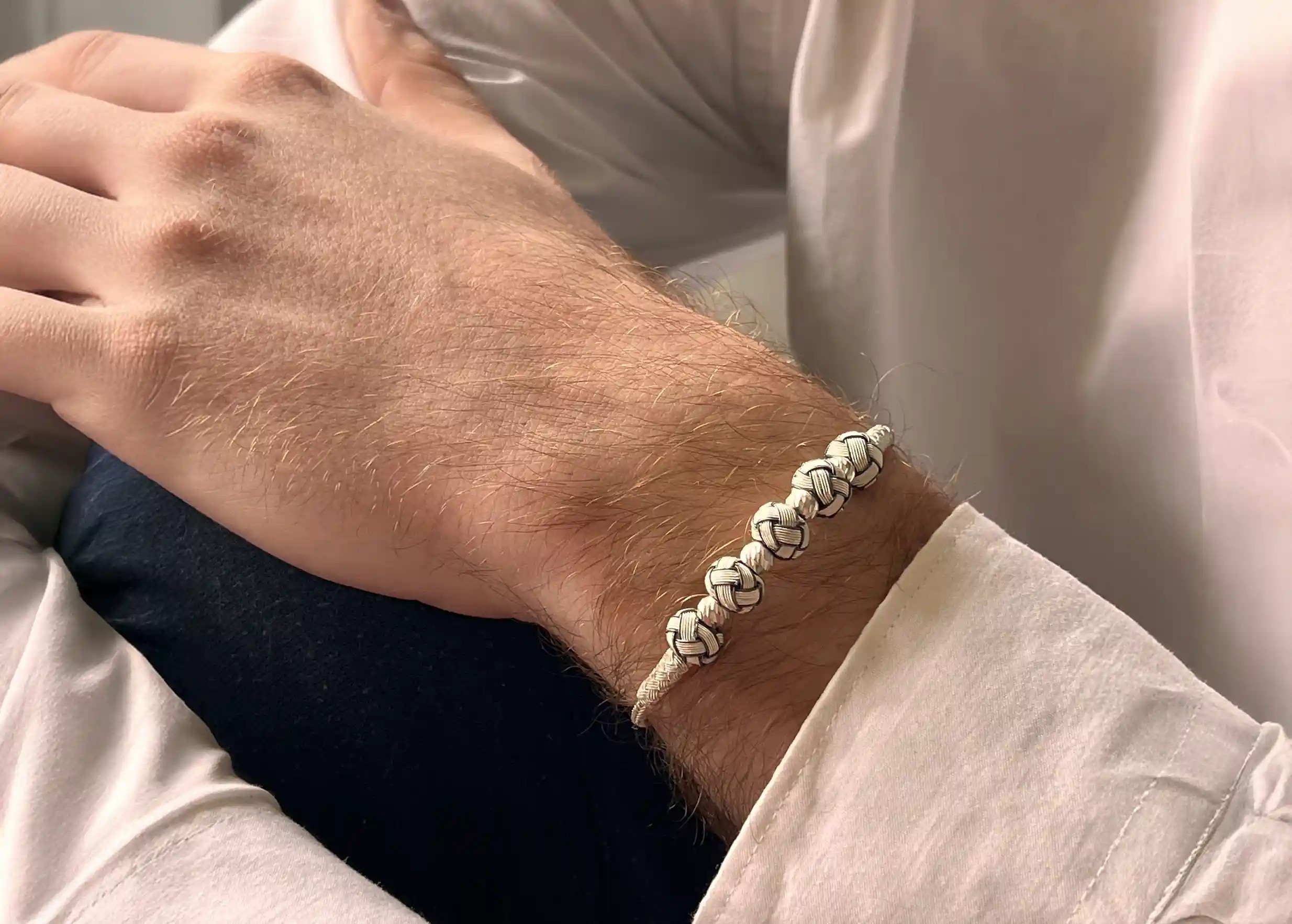 Silver and oxidised silver bracelet from the Kokaz jewellery collection, five white knots design, by Karawan