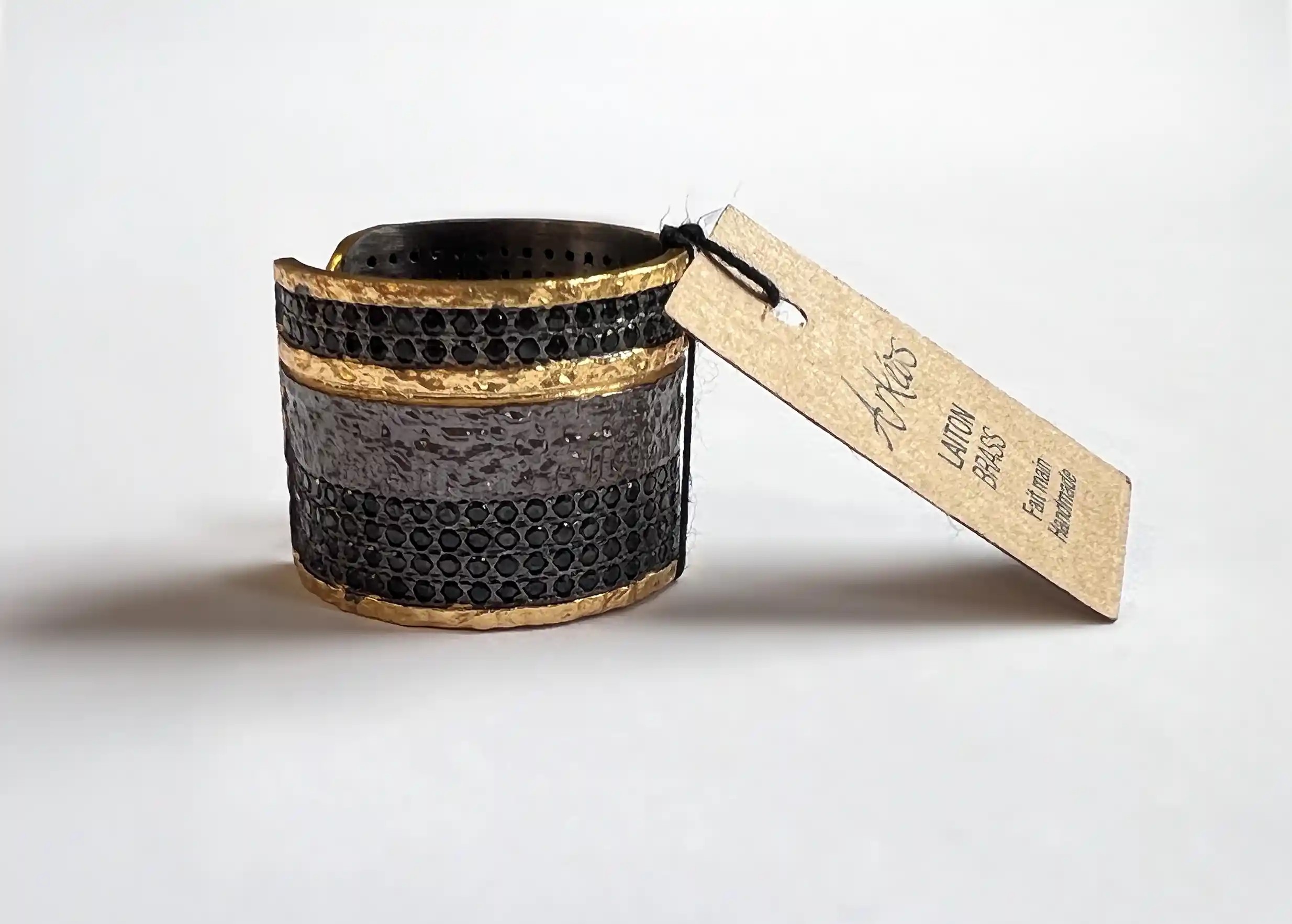 Adjustable brass and zirconium Nuit des Temps ring, hammered textures and inlaid bands with karawan label