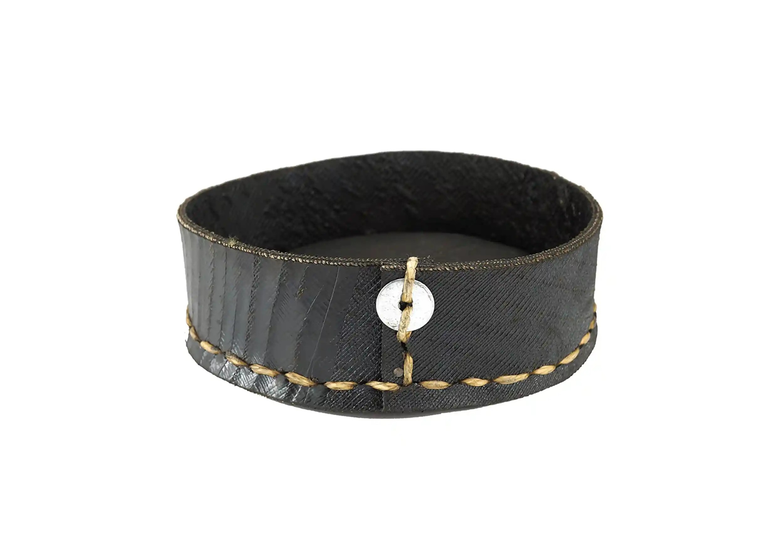 Round pocket in recycled tyre, hand-stitched and engraved Karawan authentic button on white background