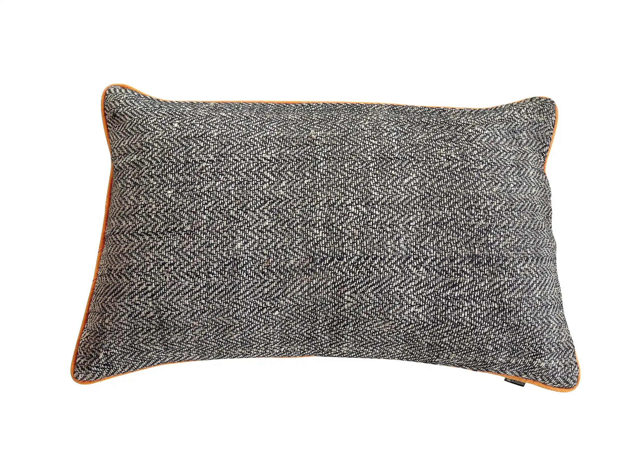 Rectangular saffron cushion made from nettle fiber and wild silk, photo taken from behind on a white background