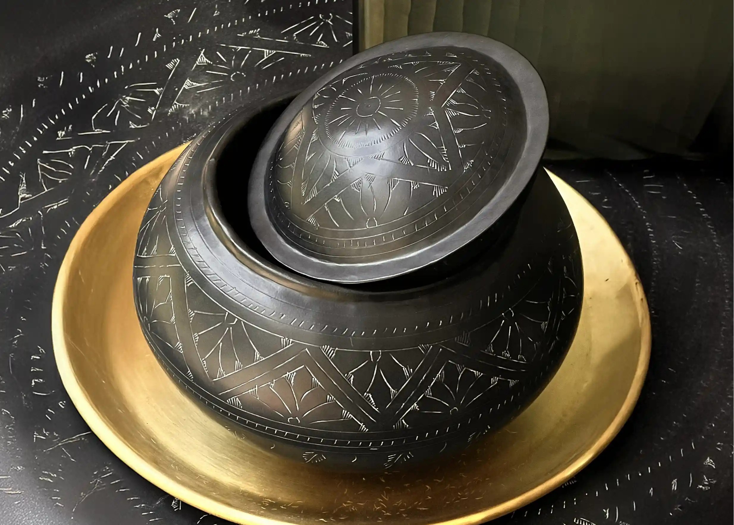 Black oxidised and engraved brass box on a gilded brass tray, all by Karawan.