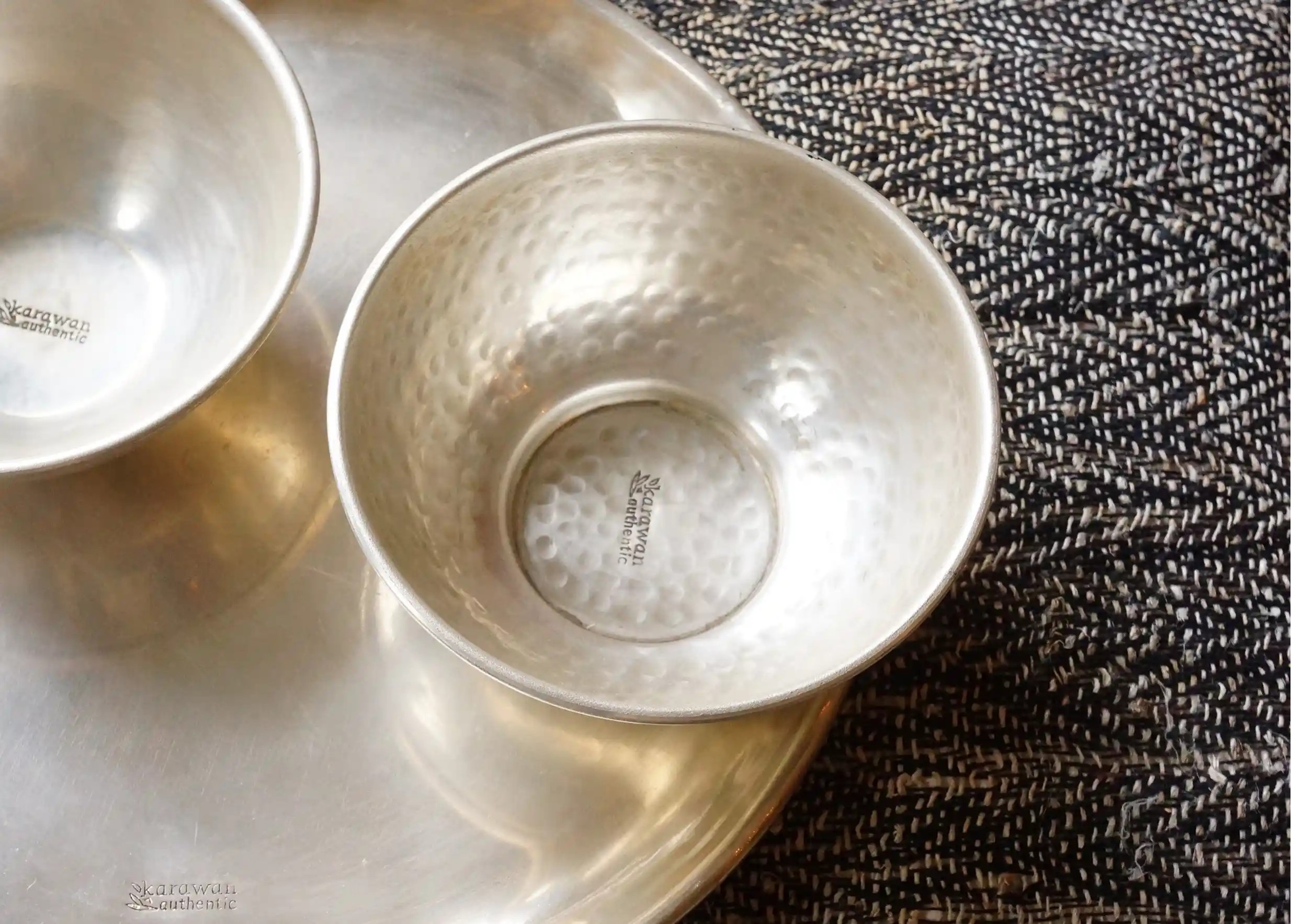 Hammered silver-plated brass hammam bowl on smooth tray by Karawan