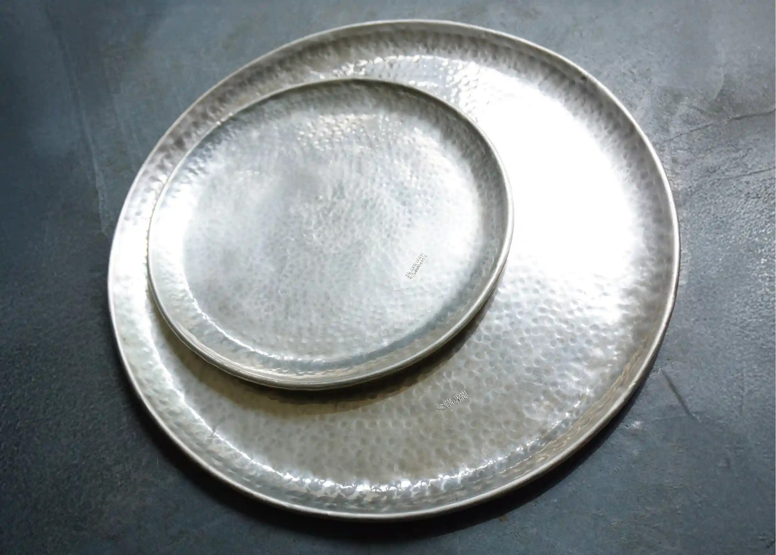 2 silver and hammered Konya trays, different sizes, authentic Karawan logo