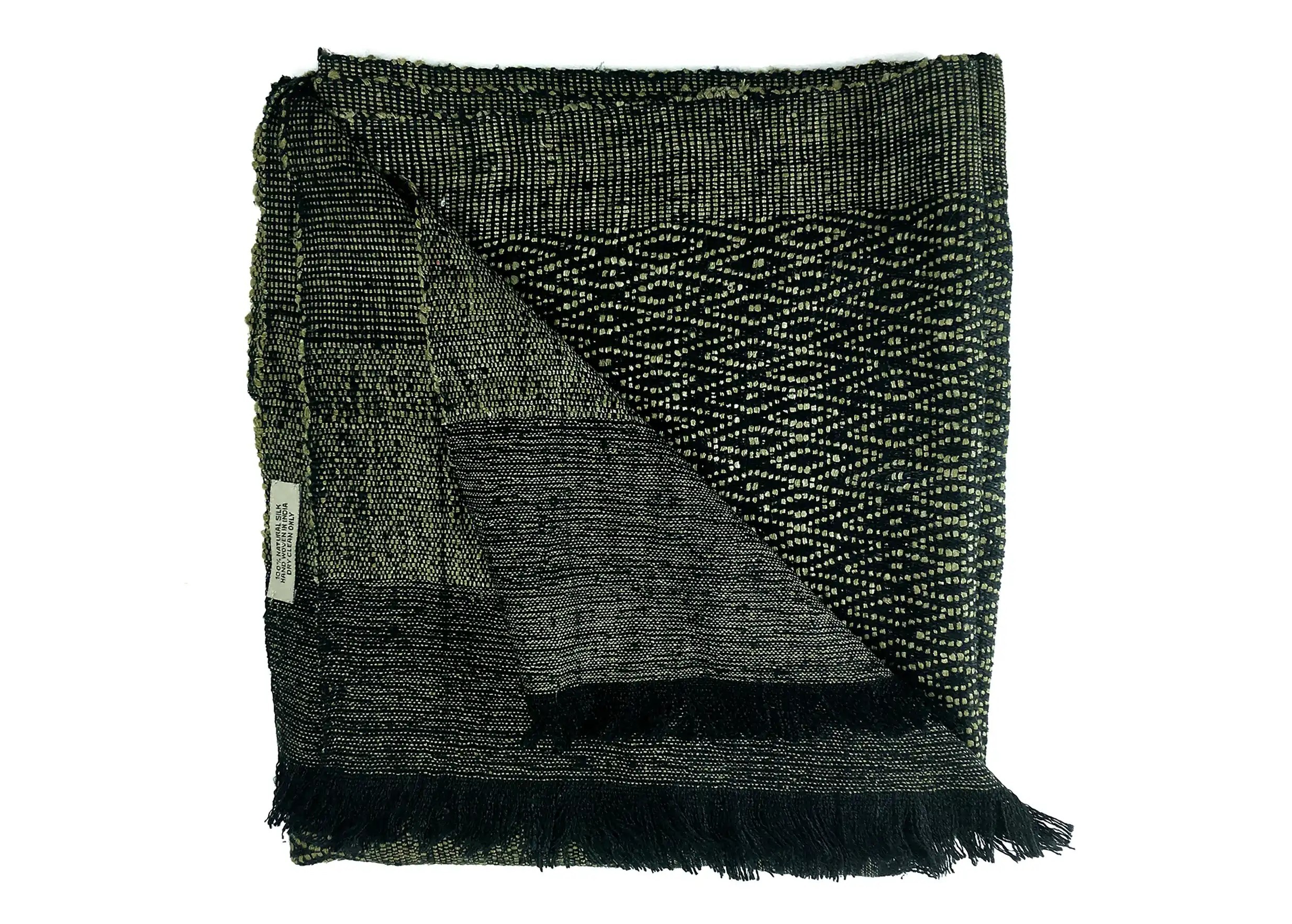 Green stole in Eri silk, Eshani model, folded into a square, with fringes that stick out.