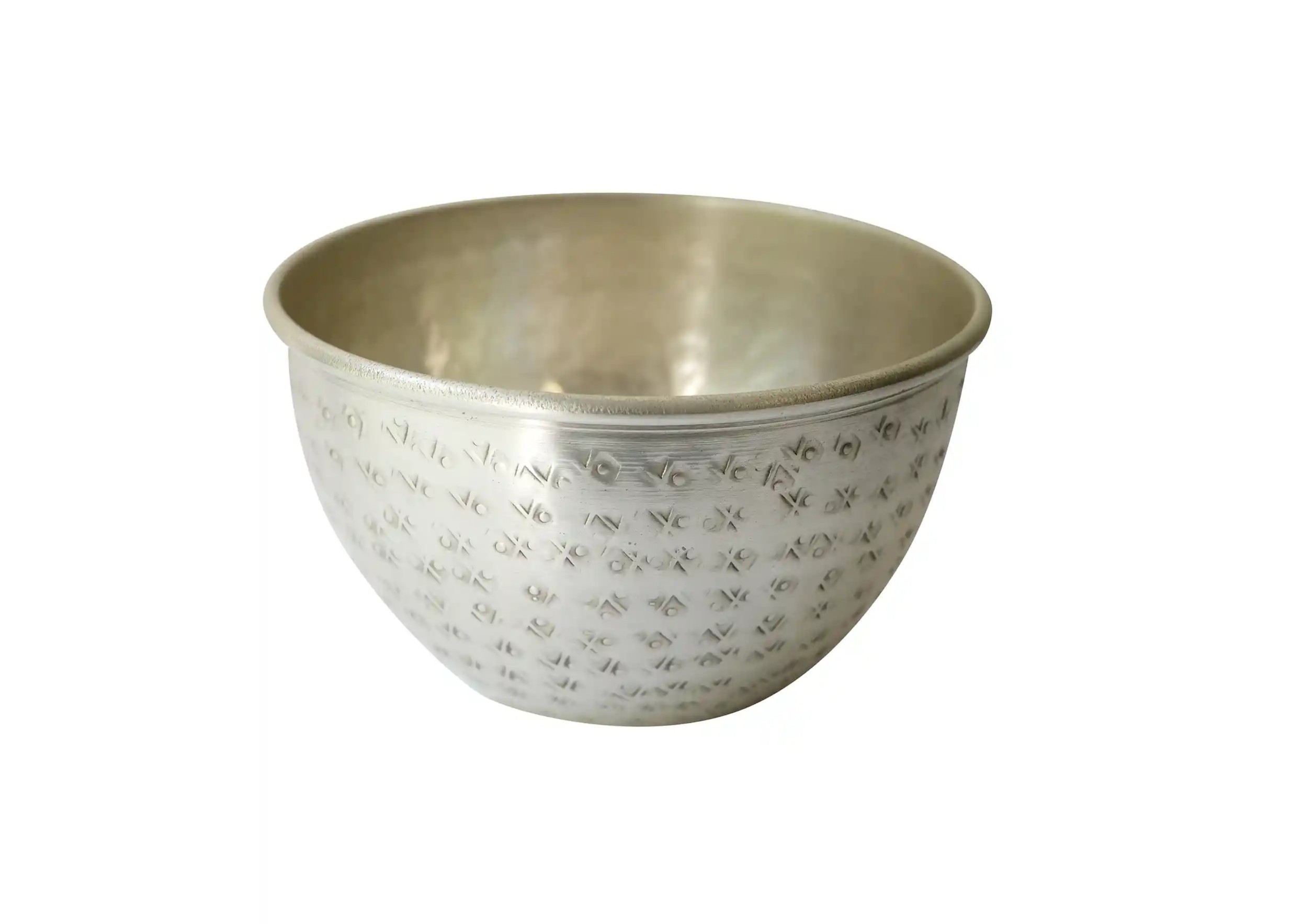 Palmyr bowl in hammered silver-plated brass by Karawan. Photo taken against a white background