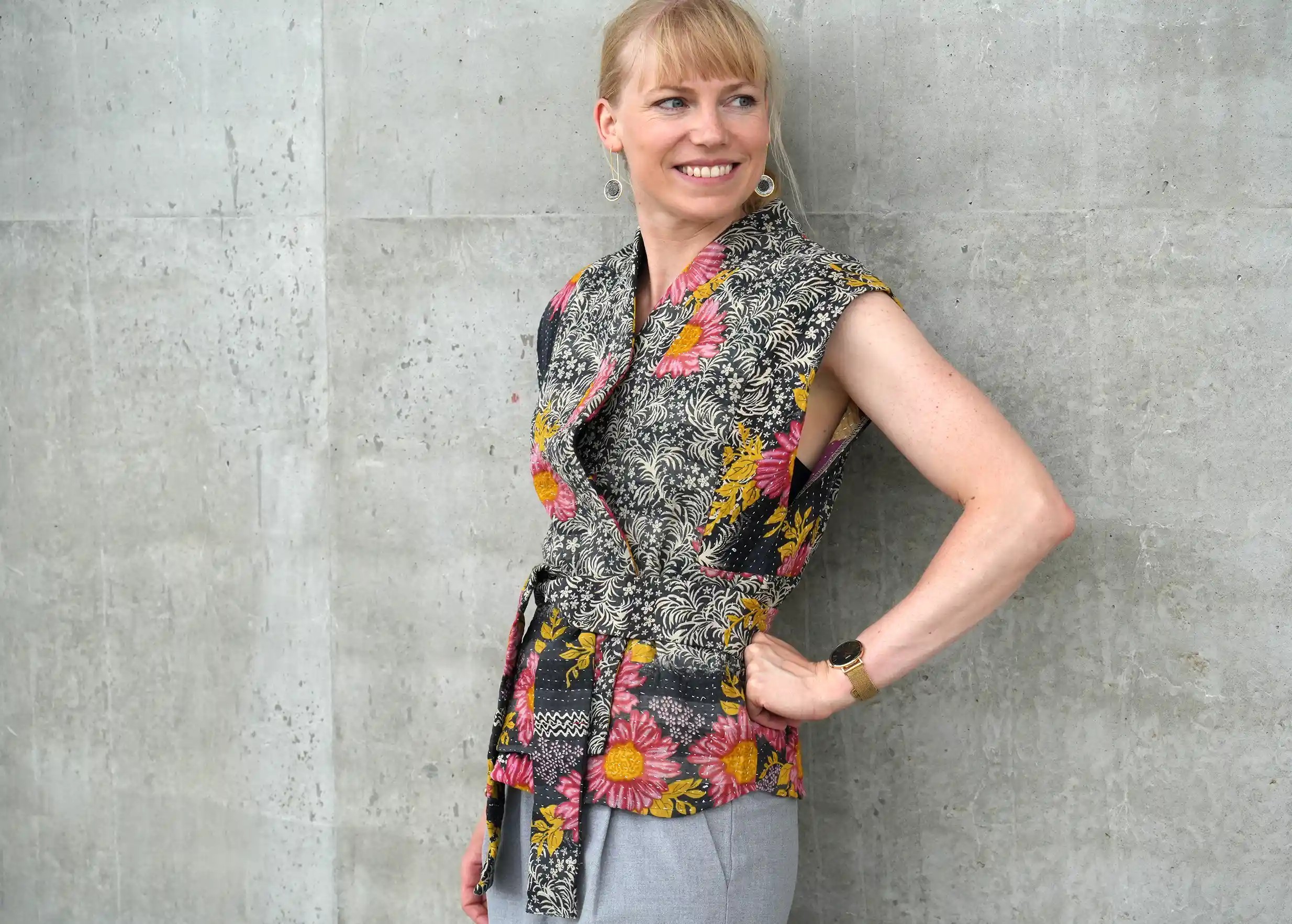 Smiling woman wearing a quilted Kanta cotton kimono waistcoat
