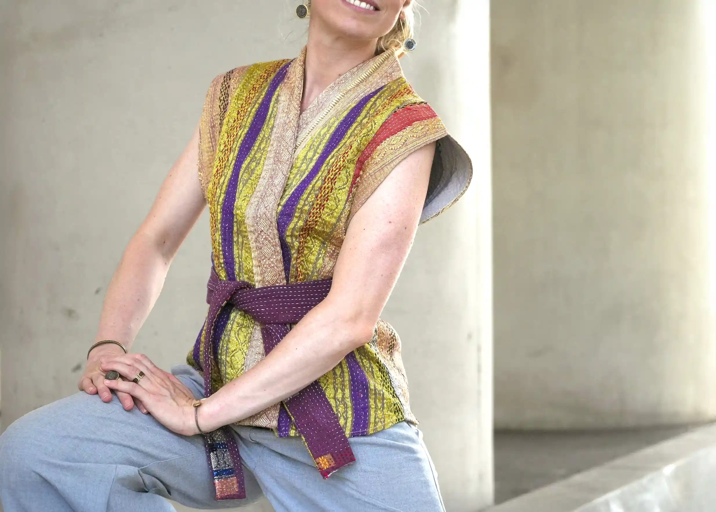 Woman wearing a unisex quilted cotton kimono cardigan by Karawan