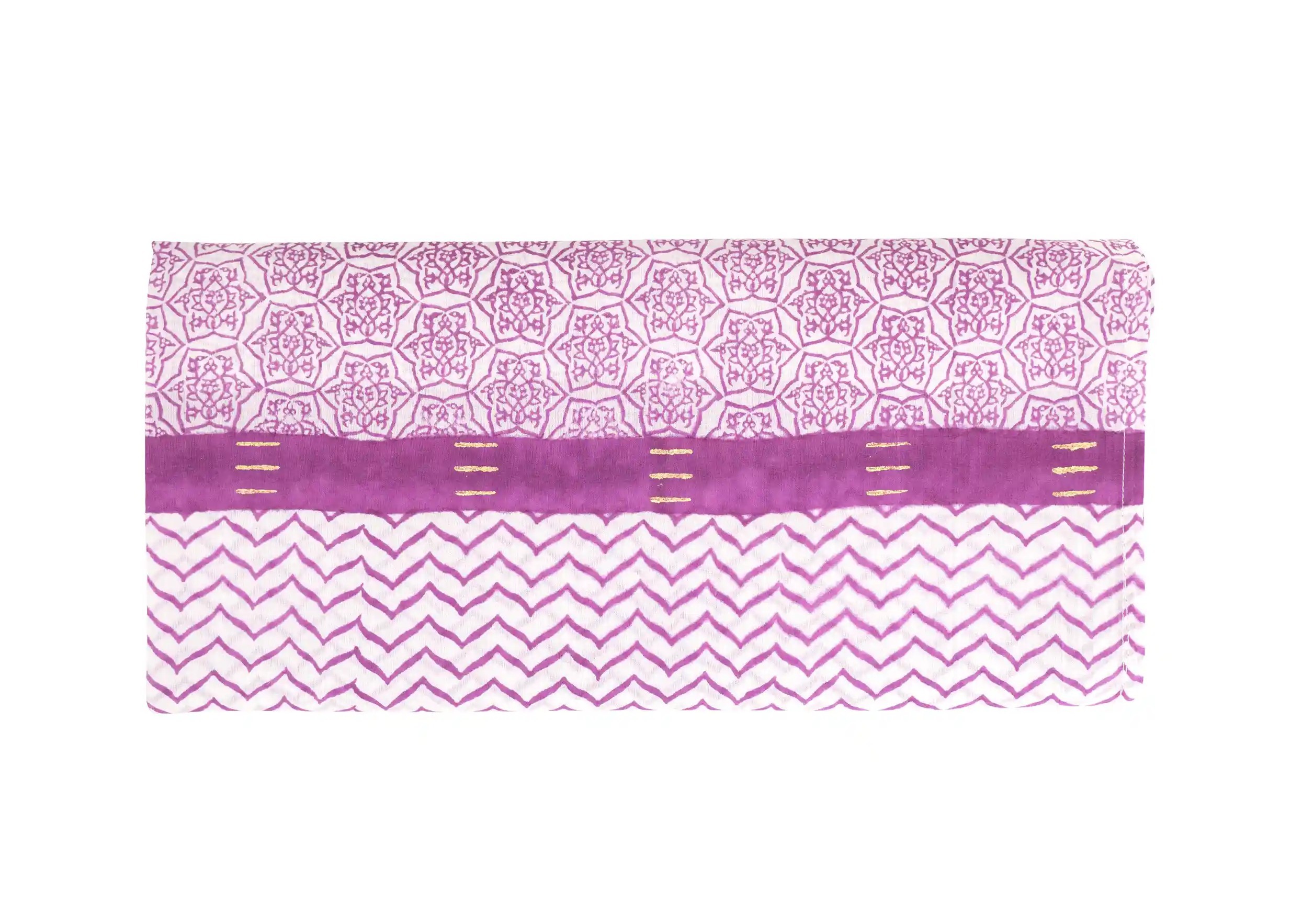 Close-up of a 100% cotton pareo, Karawan rosette motifs printed using block printing, plum colour