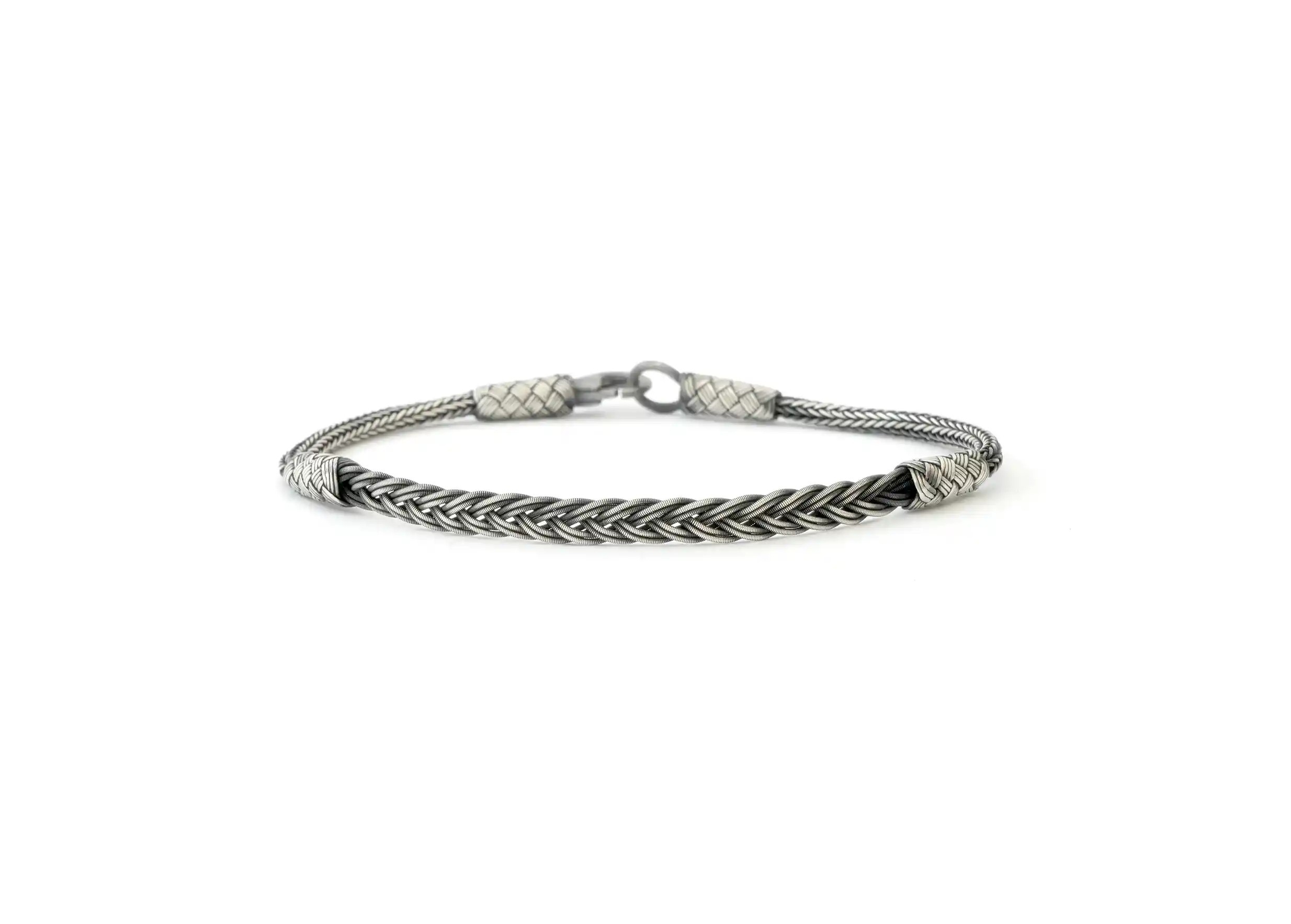 Bracelet from the Kokaz collection, fine braided model, photo taken against a white background