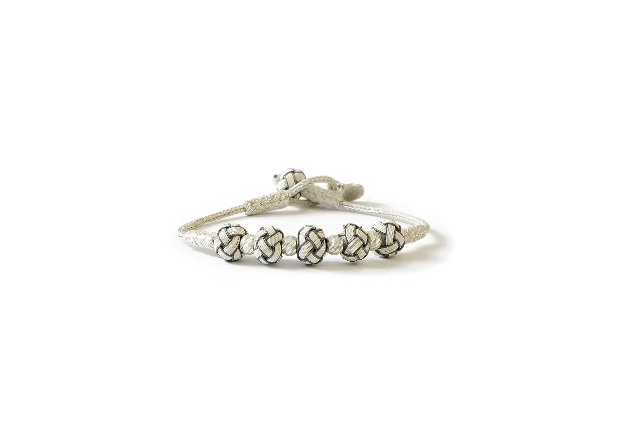 Silver bracelet with 5 white knots, by Karawan