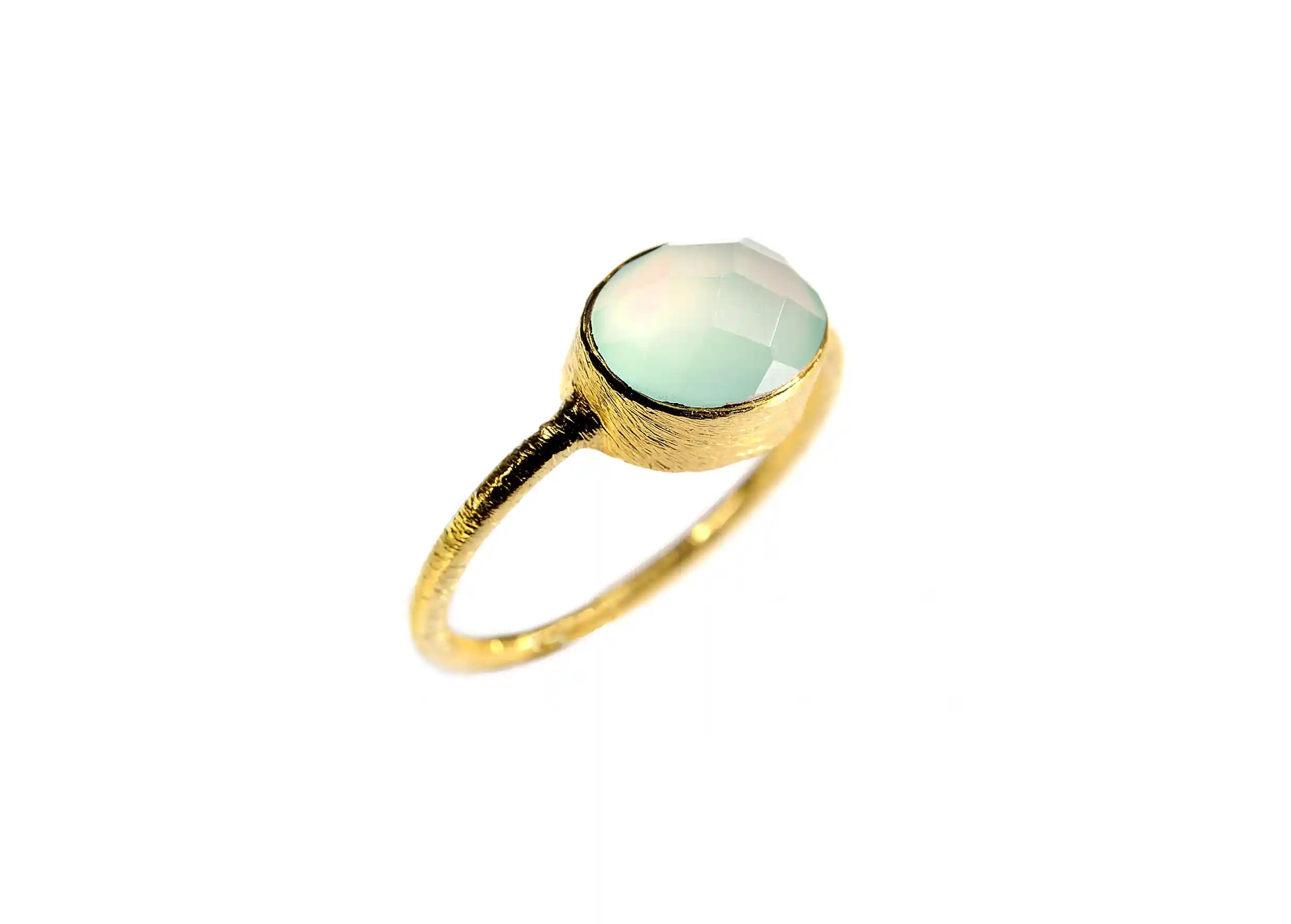 Gold-plated Drop ring, chalcedony on a white background