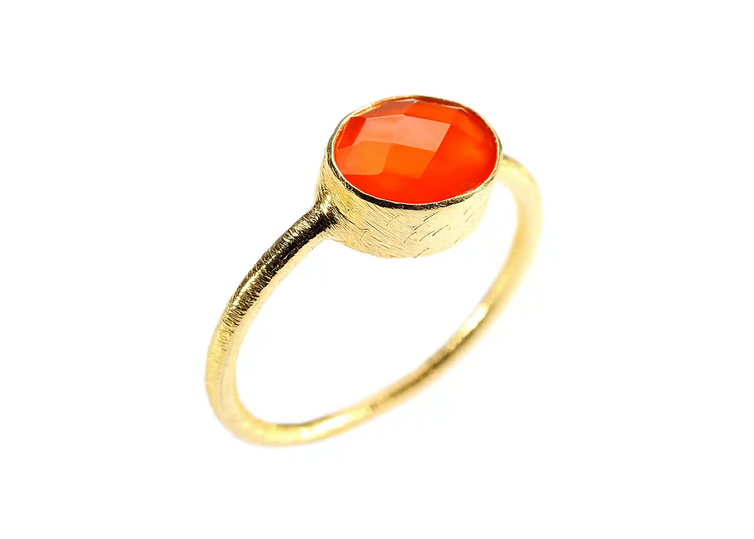 Gold-plated Drop ring with carnelian stone, on a white background