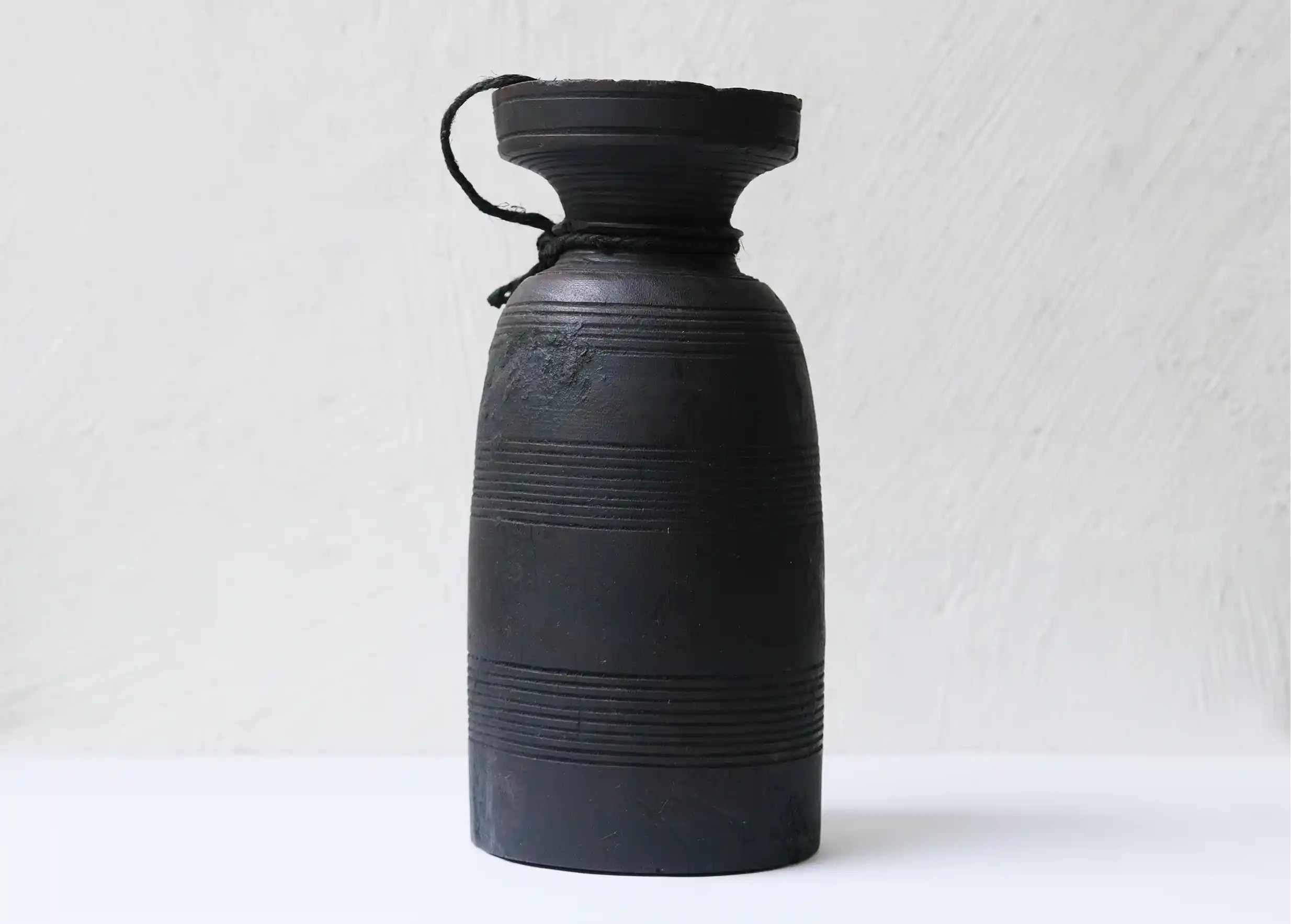 Wooden pot, Himalayan yak butter model no. 1, from the Karawan Authentic brand, on a white background