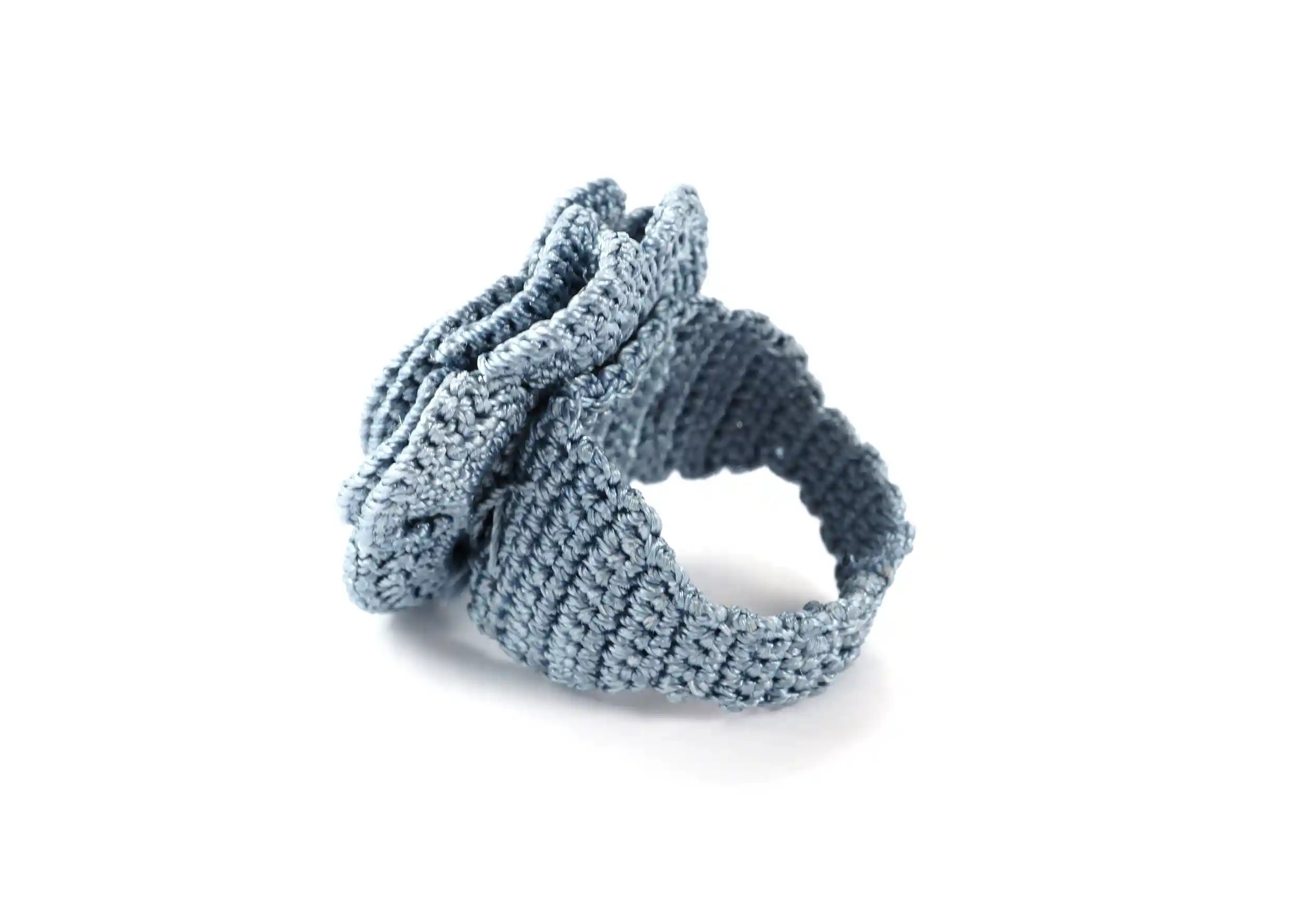 Belkis lace ring in pearl grey on a white background