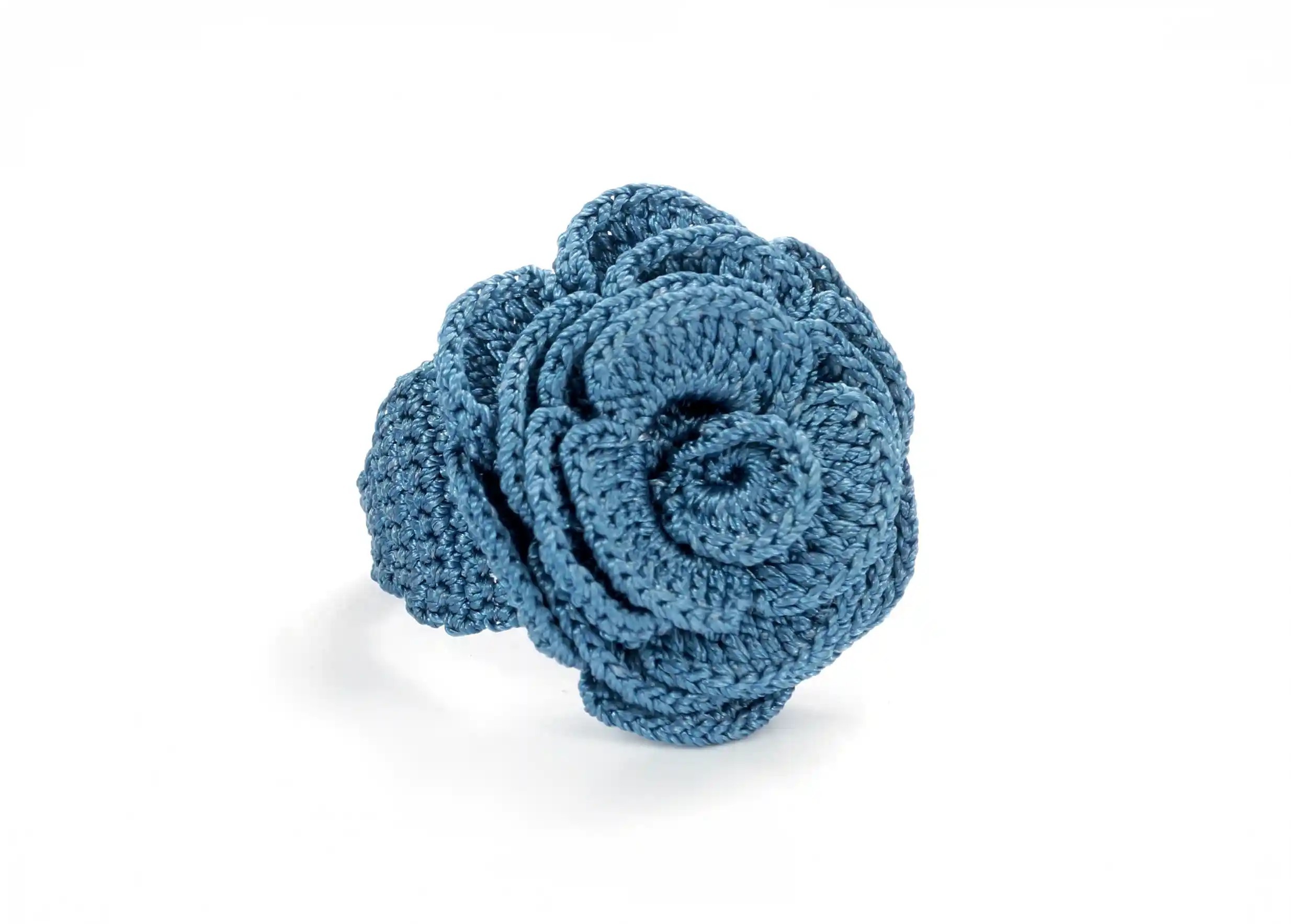 Jean-coloured lace ring, front view on white background