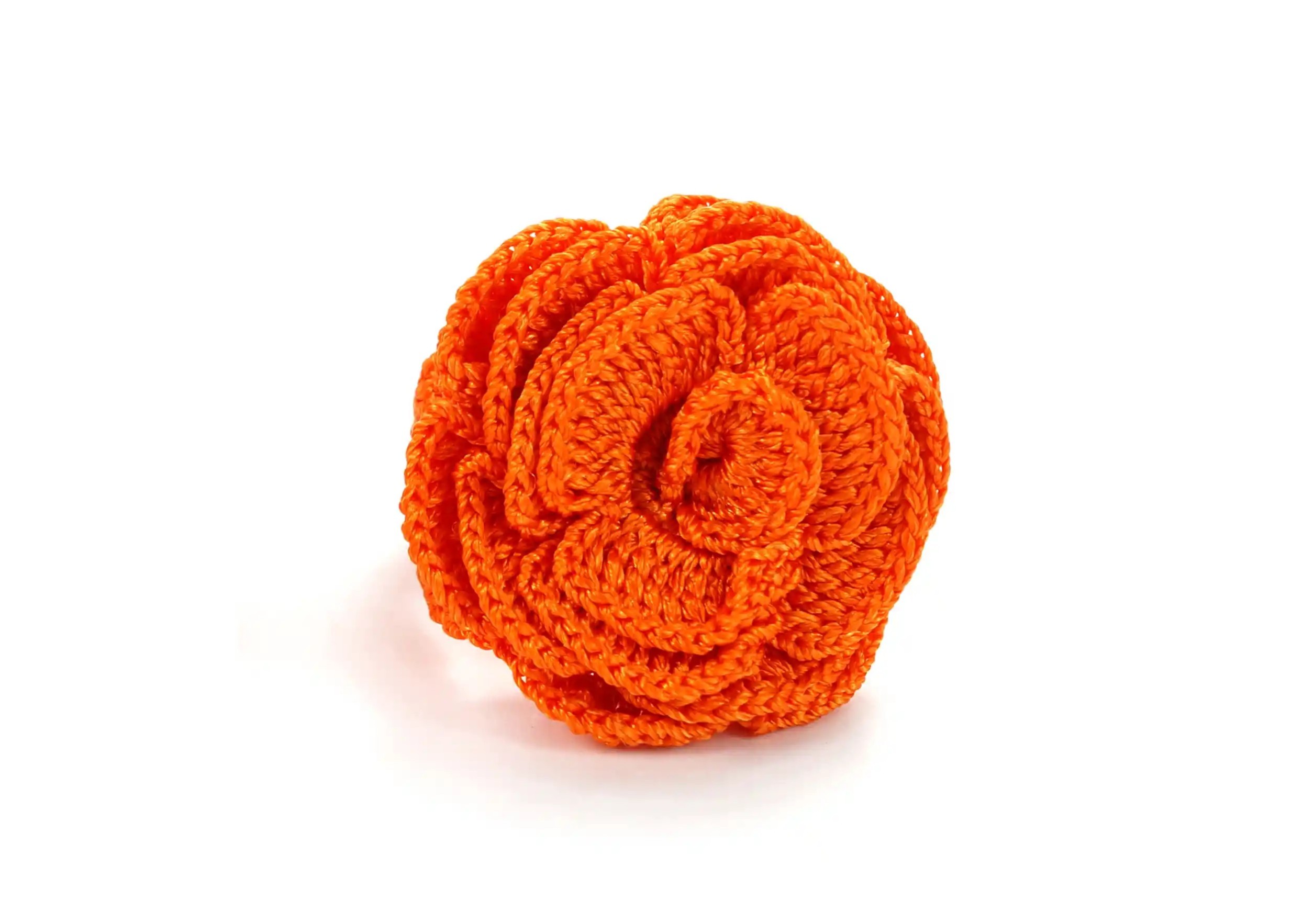 Papaya-coloured Beklis lace ring, front view, twisted floral design