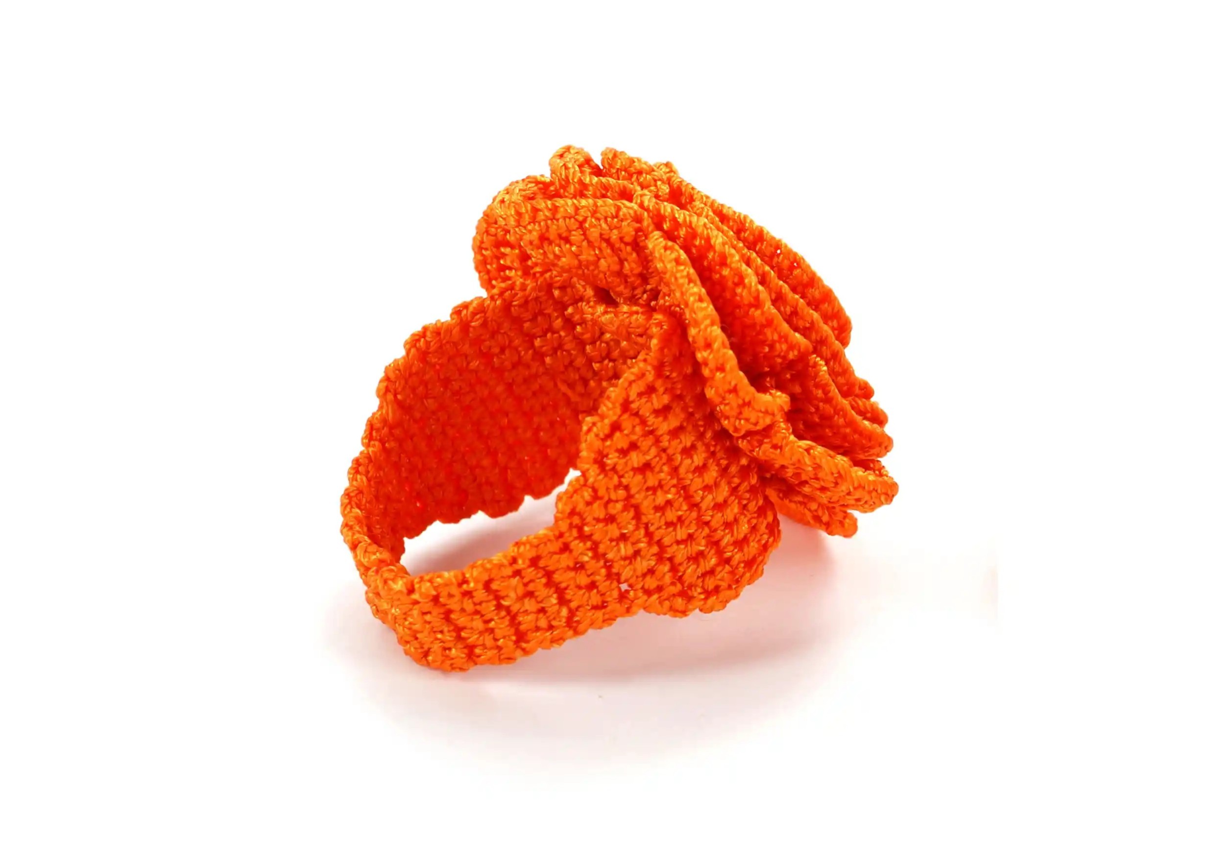 Belkis lace ring, Papaya colour, on a white background