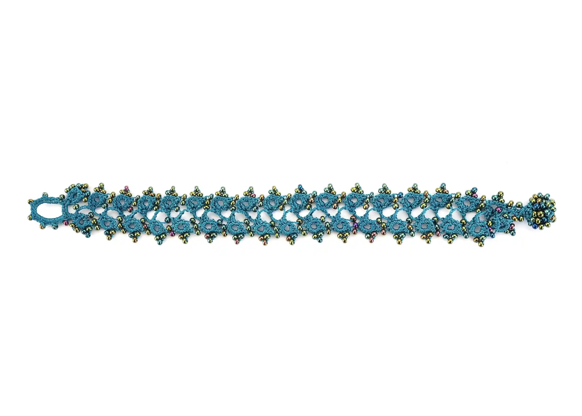 Husnu lace bracelet, Lagoon colour, horizontal view
