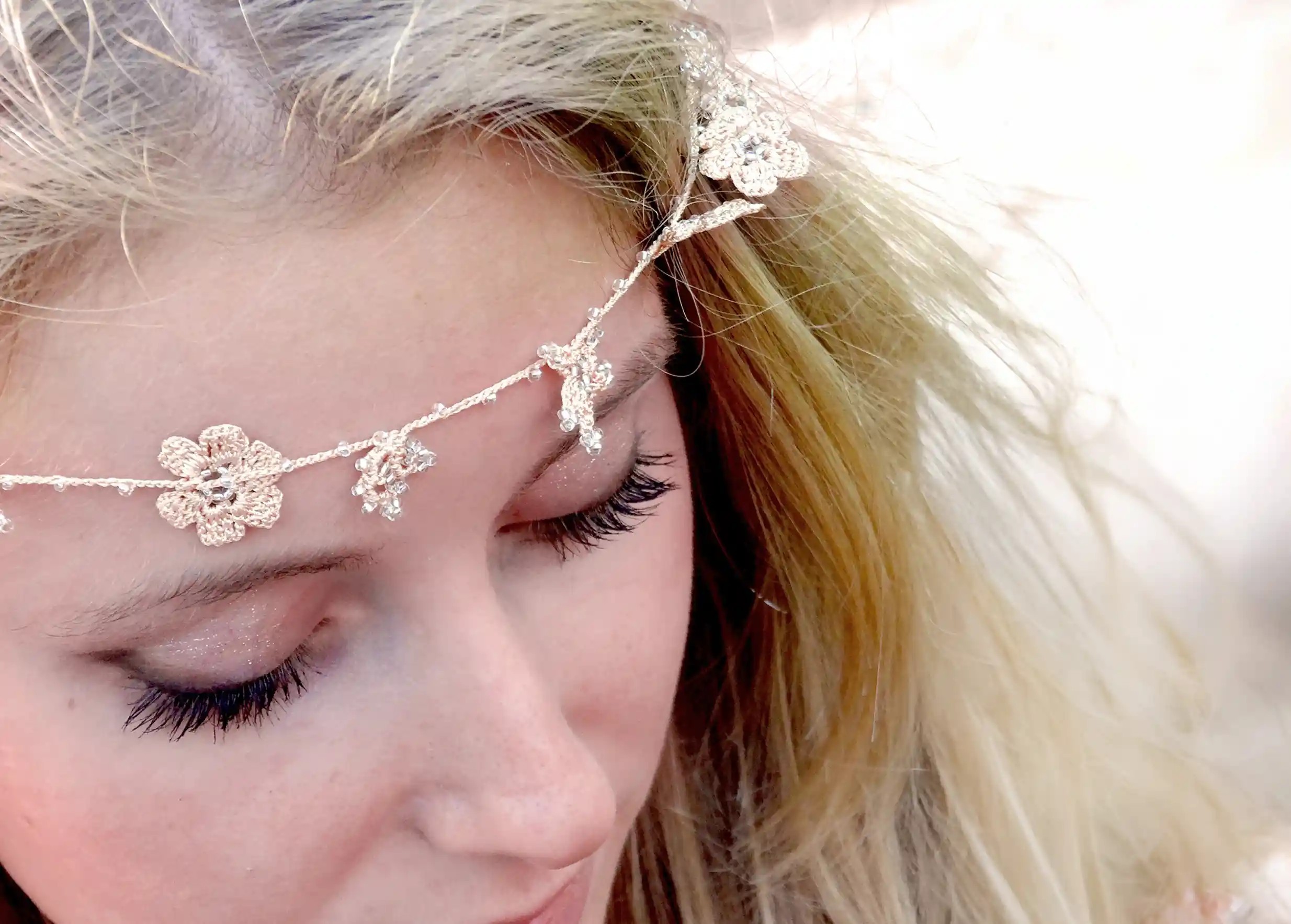 Ivory-coloured Crystal lace choker worn by a woman outdoors