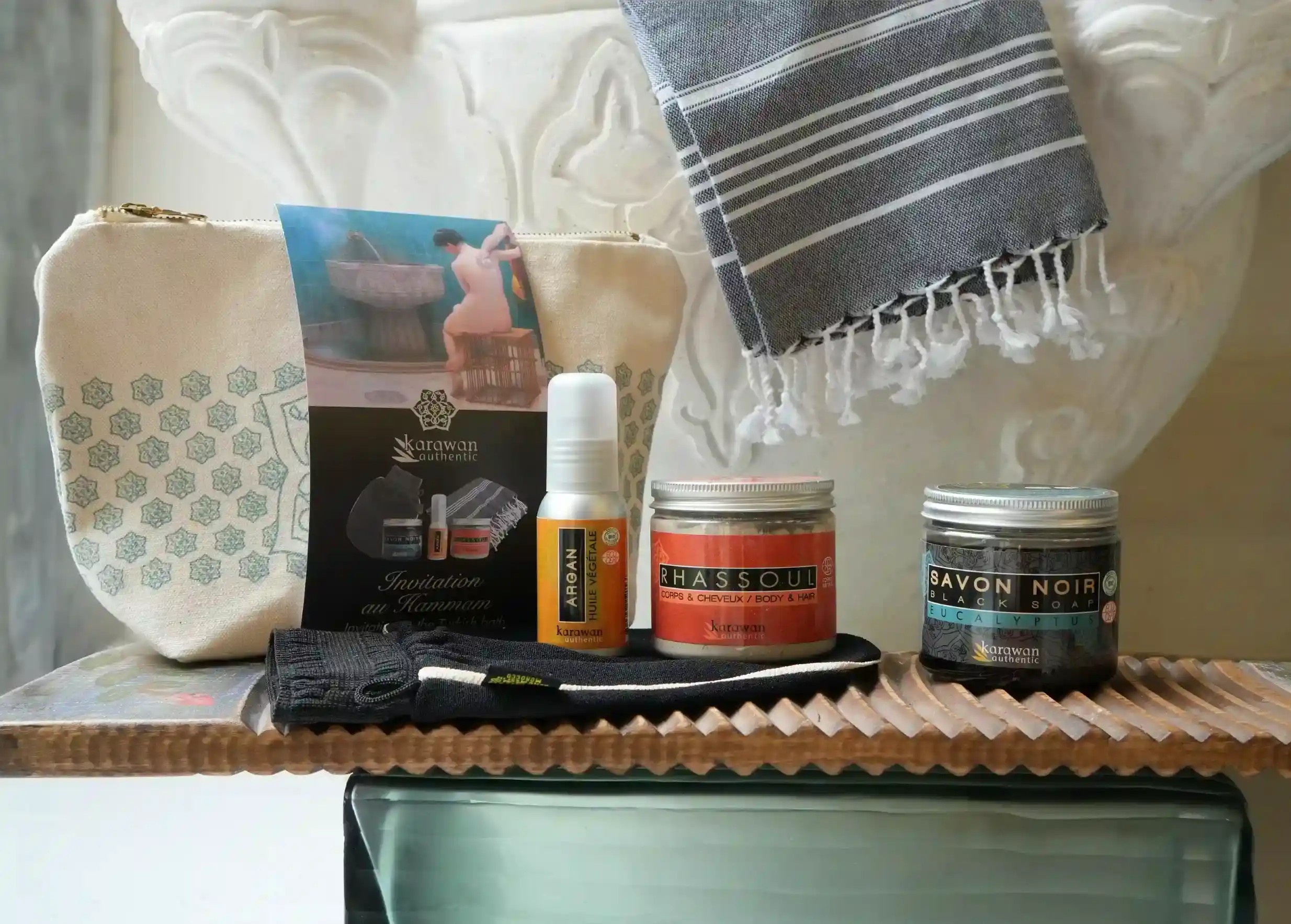 Hammam invitation kit with toiletries kit, cotton fouta, argan oil, rhassoul and black soap