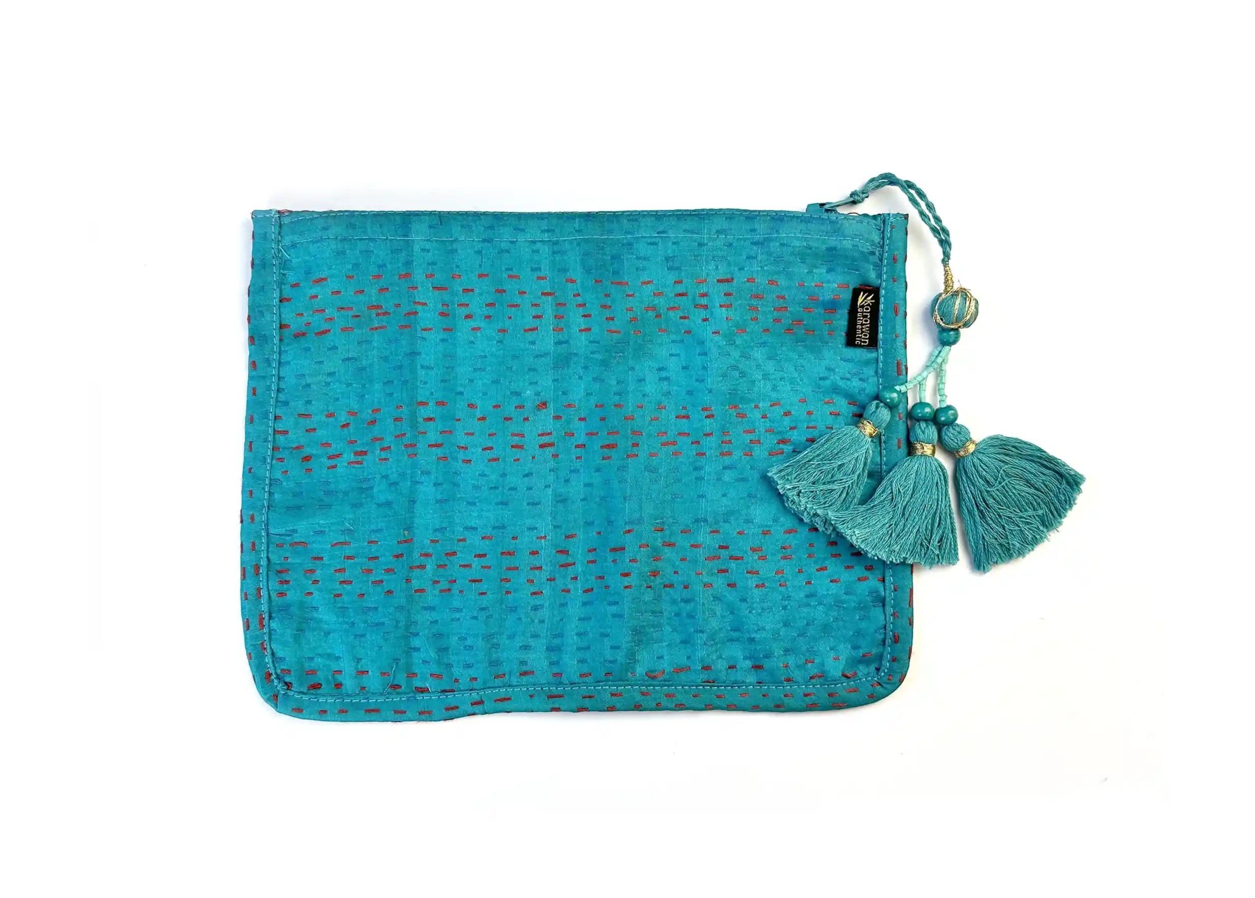 Light blue handmade clutch bag in recycled kanta silk, model no. 01, with tassel, from the brand Karawan Authentic