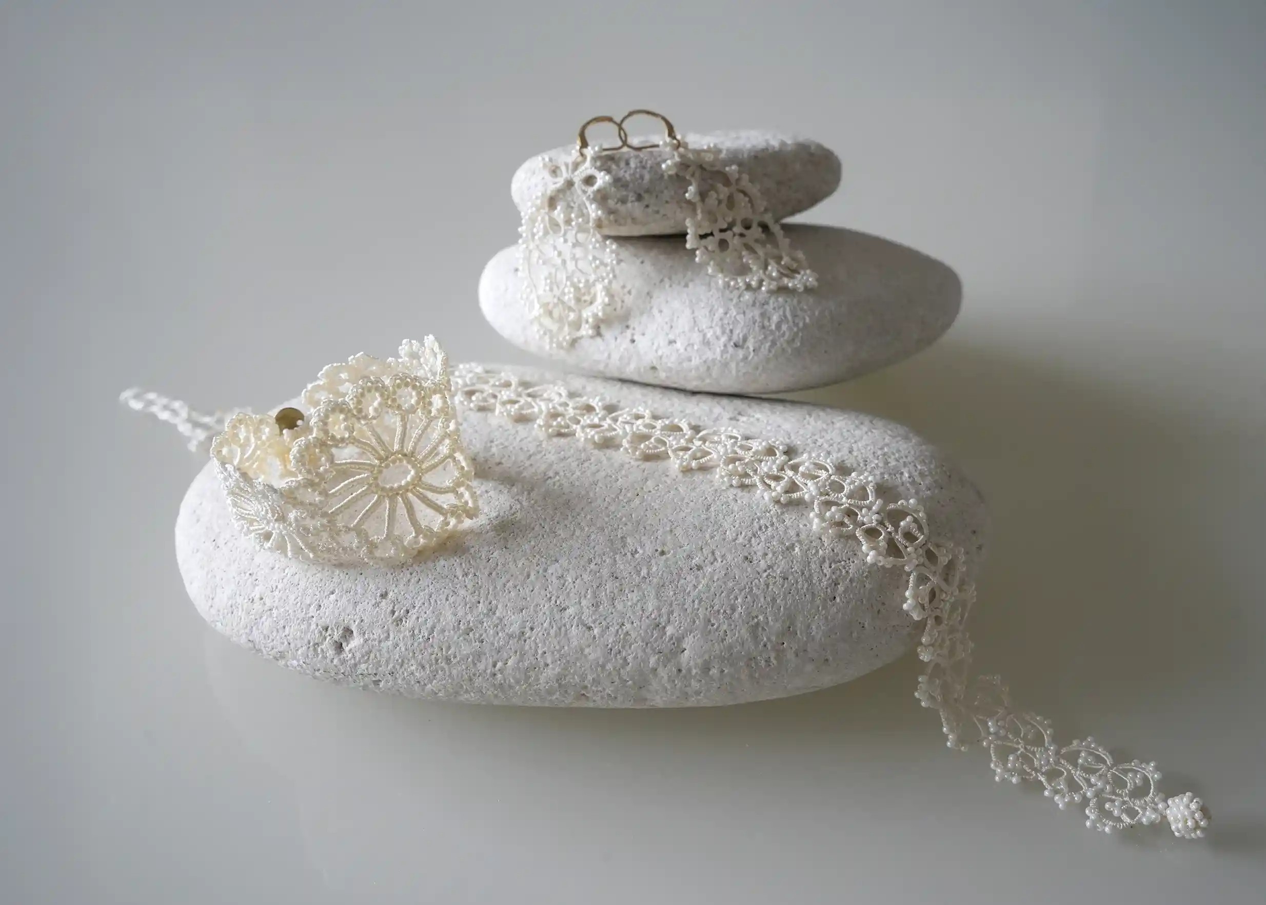 Assortment of several models from the Oya jewellery collection in light ivory colours