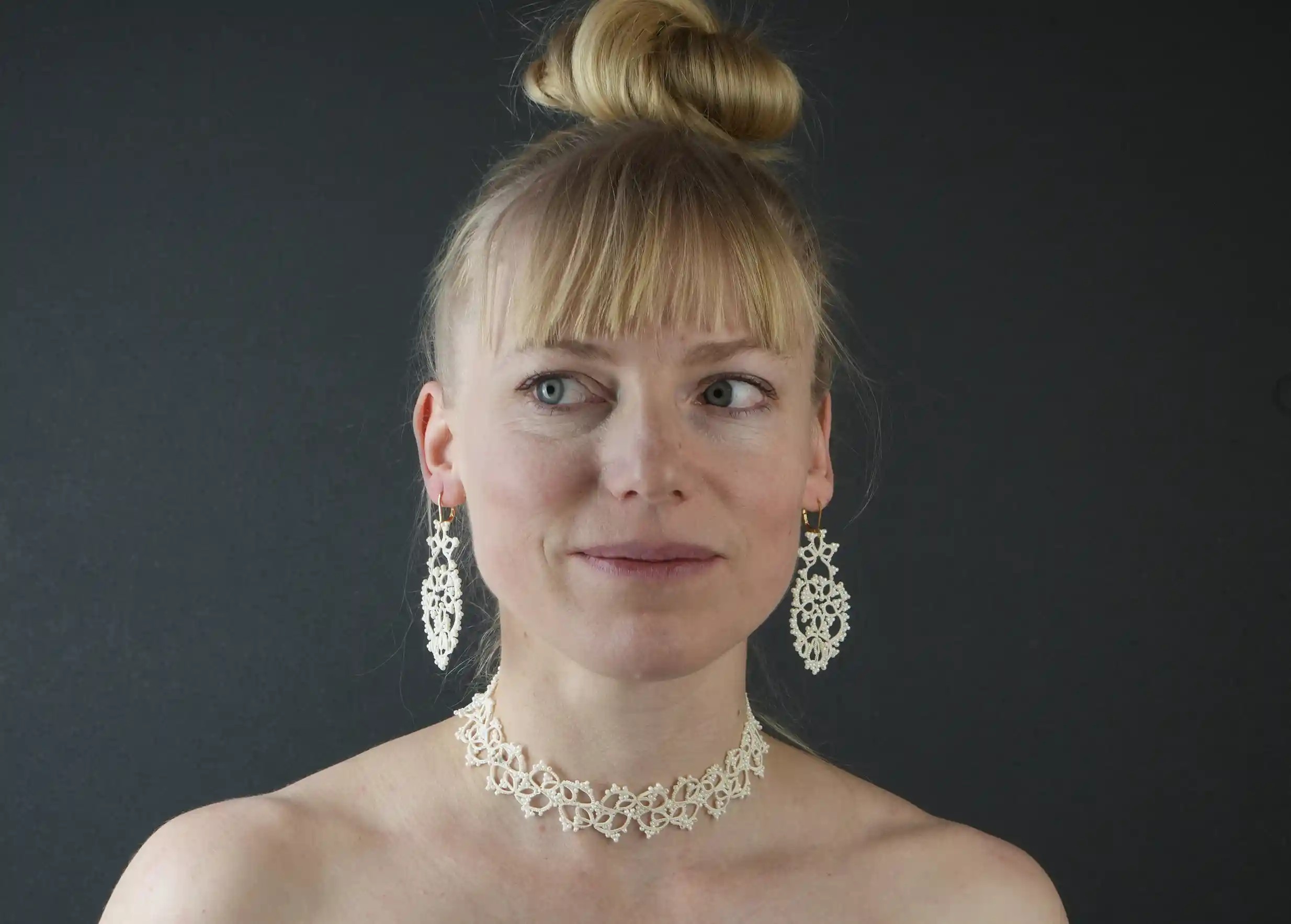 Woman wearing Karawan Authentic's lace jewellery range