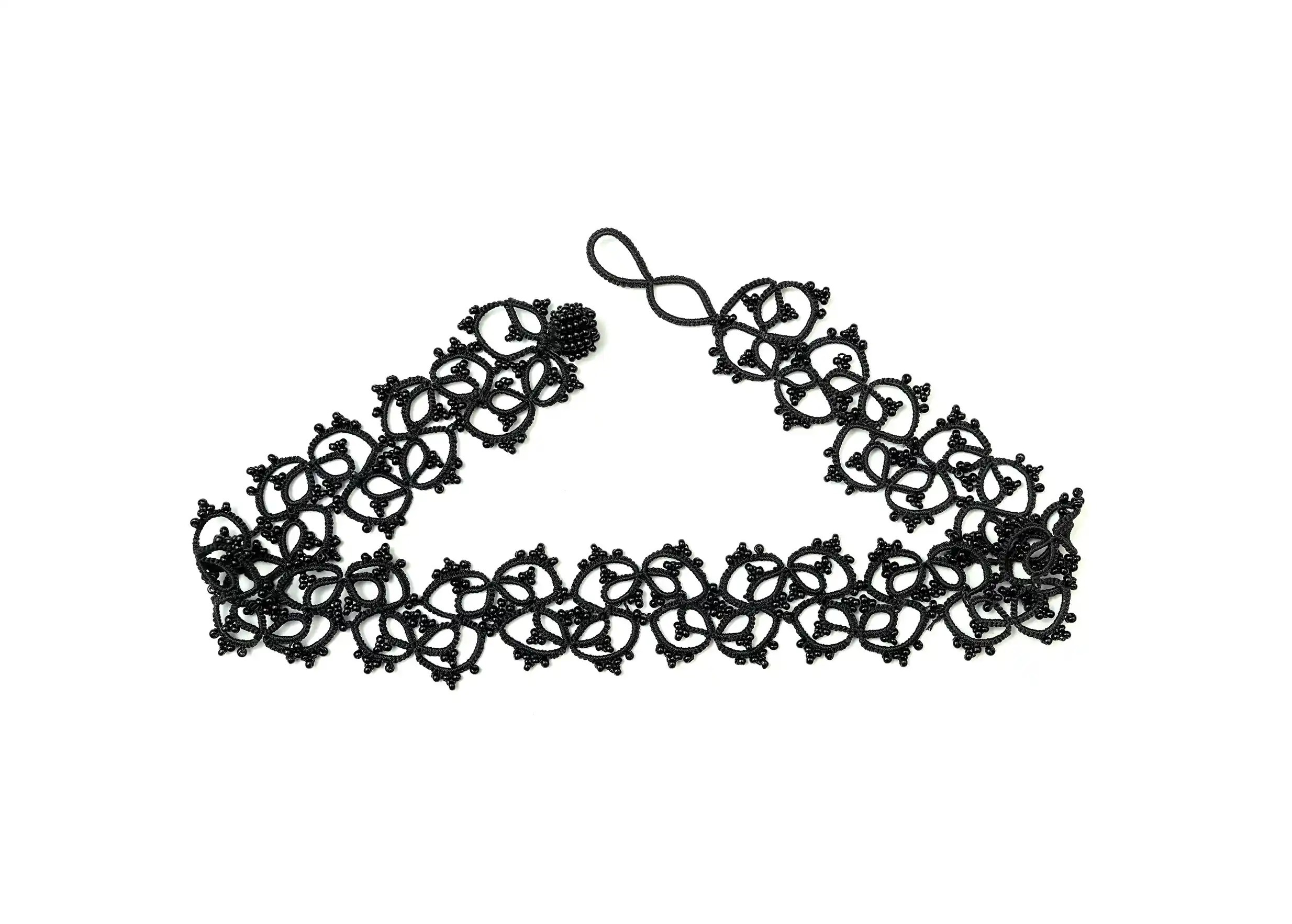 Black lace choker necklace, handmade, photo taken against a white background