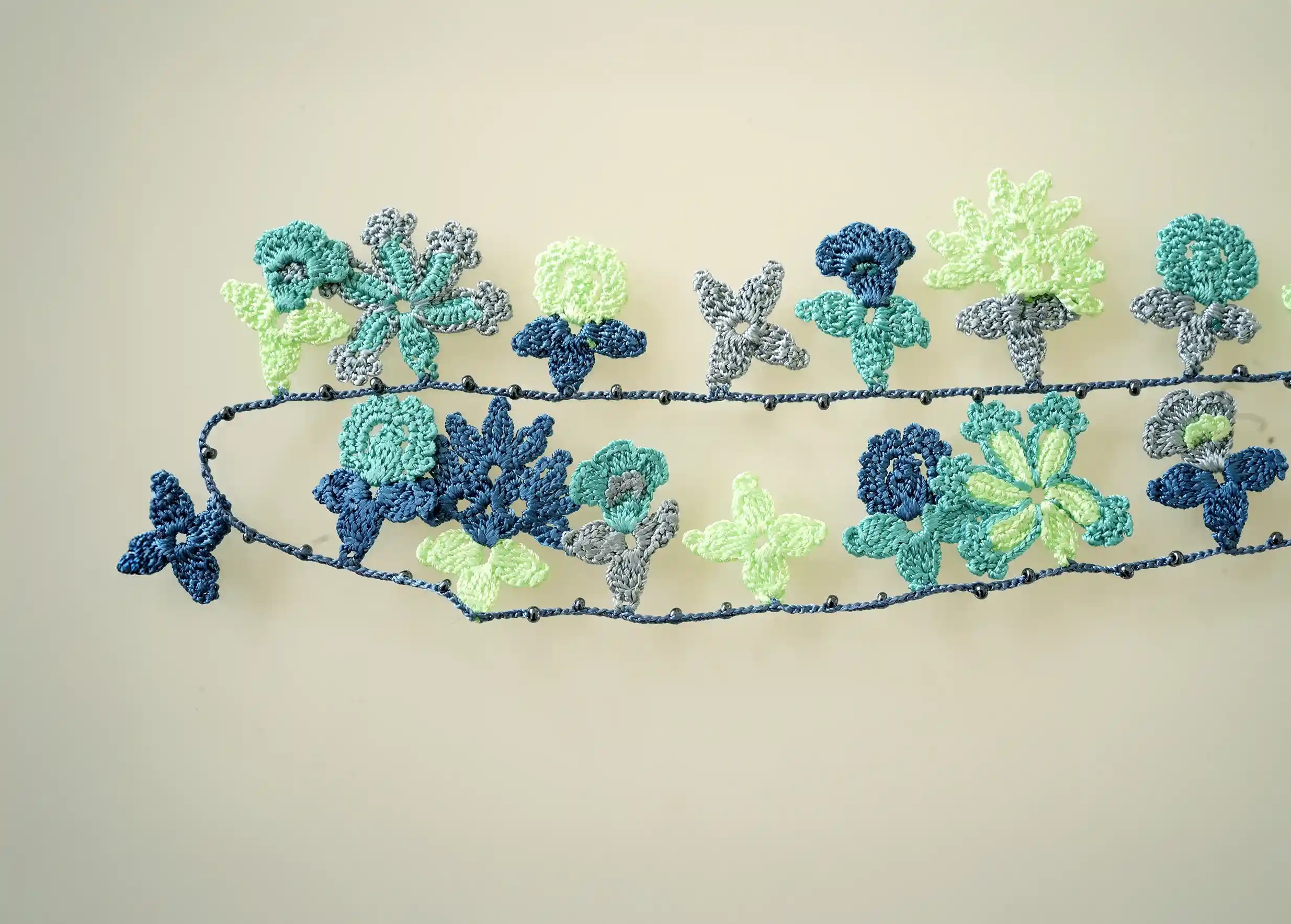 Long lace necklace with floral and leaf motifs, Bloom ocean colour