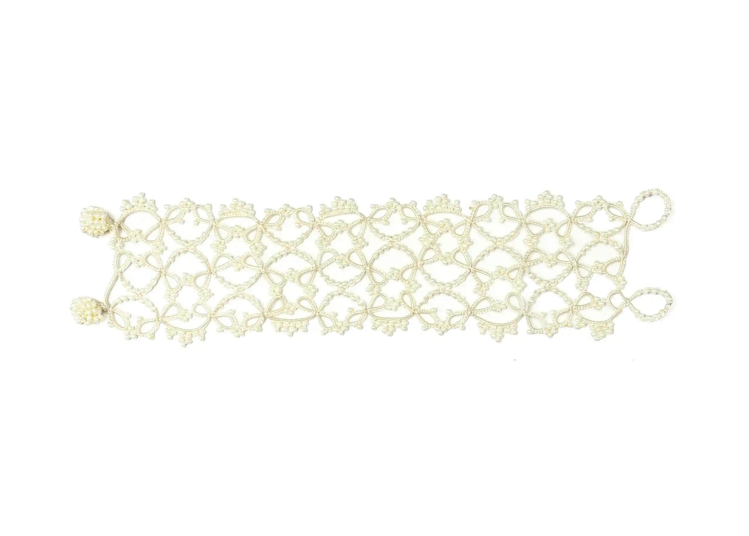 Wide lace cuff bracelet, Crown model in light ivory, photo taken against a white background