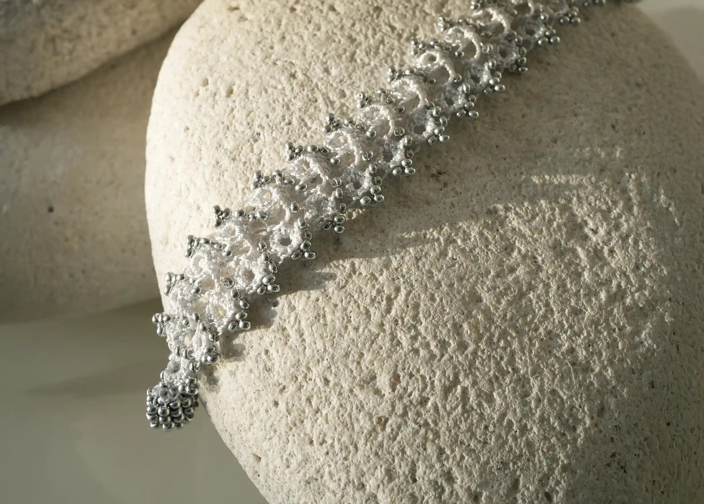 Handmade lace textile bracelet, Husnu, OYA collection, silver grey colour