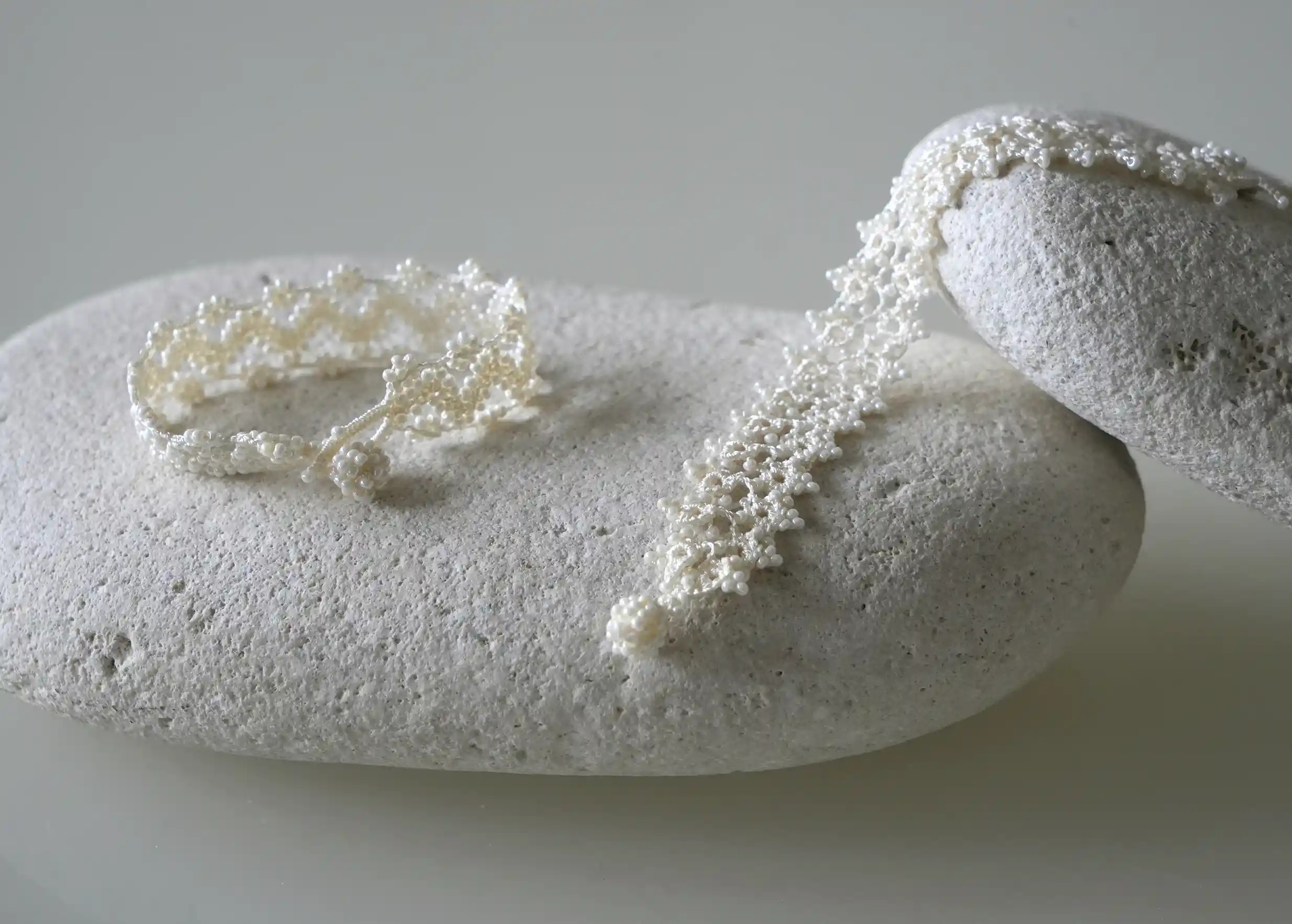 Pair of handmade lace textile bracelets, Husnu model, OYA collection, light ivory colour