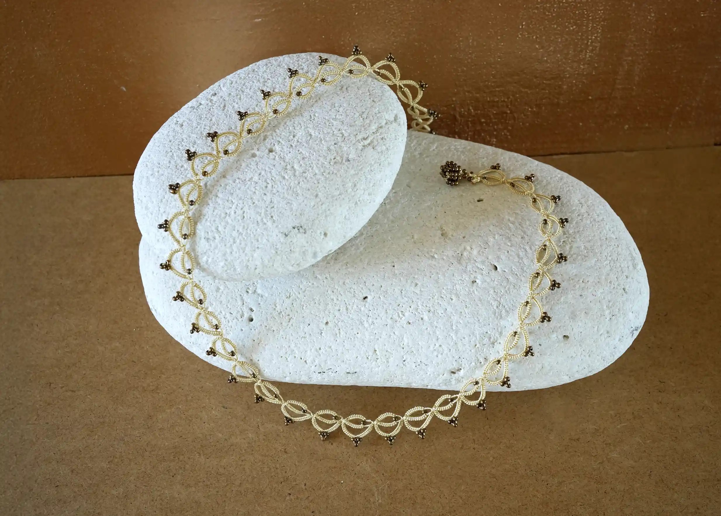Handmade choker necklace made from thread and beads, Lotus Chain in beige, gold and copper colours